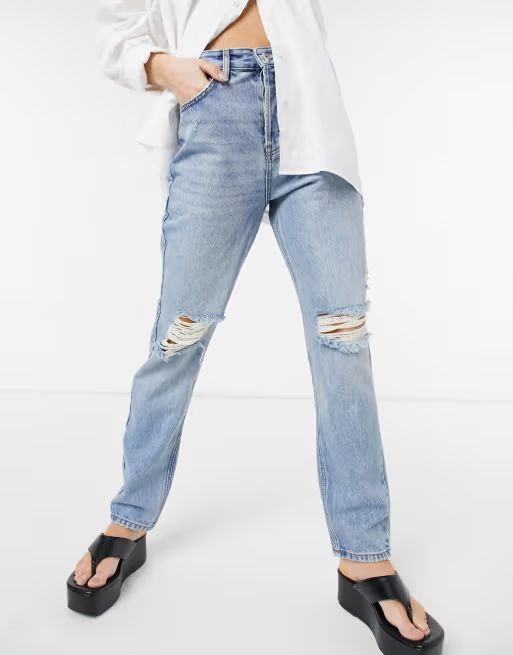 River Island 90's high rise ripped jeans in light authentic blue | ASOS (Global)