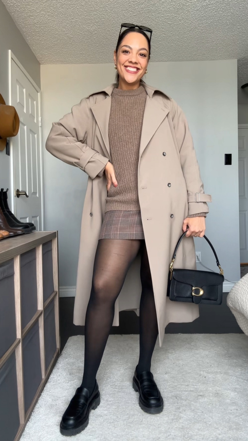 Ways to wear a crewneck sweater! Details below:

-Poppy Barley crewneck sweater in the colour dune. Made with 100% superfine lambswool. Super soft and versatile! I’m wearing a large. 
-Plaid mini skirt, similar linked. 
-H&M tights, I have a large. 
-Poppy Barley black leather chunky loafers. 
-Oak + Fort oversized trench coat in the colour brindle. I have a medium. 
-Coach tabby shoulder bag 26 in black pebble leather. 
-COS gold mini hoops. 
-Celine Triomphe 52mm sunglasses in black acetate. 


#LTKstyletip #LTKSeasonal #LTKfindsunder100