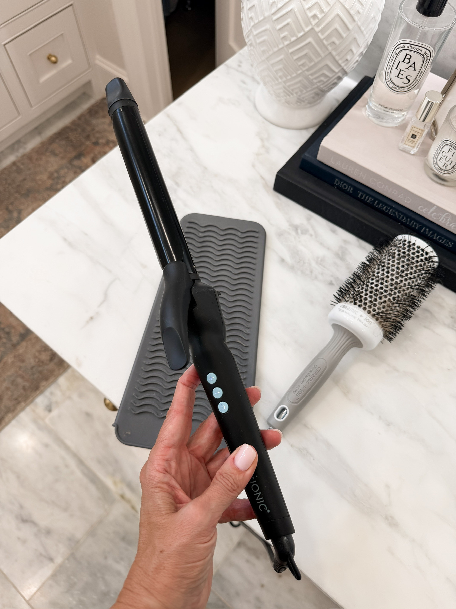 A good curling iron makes such a difference when styling your hair! I love this one from Bio Ionic for creating soft, loose waves with plenty of movement. It's a great tool for getting that relaxed, salon styled look at home without spending forever on your hair.
Bio Ionic curling iron, Bio Ionic hair tools, curling iron, professional curling iron, loose waves, soft curls, hair styling tools, voluminous hair, everyday hairstyles, at home blowout, hair tools for women over 40, beauty favorites, HauteandHumid