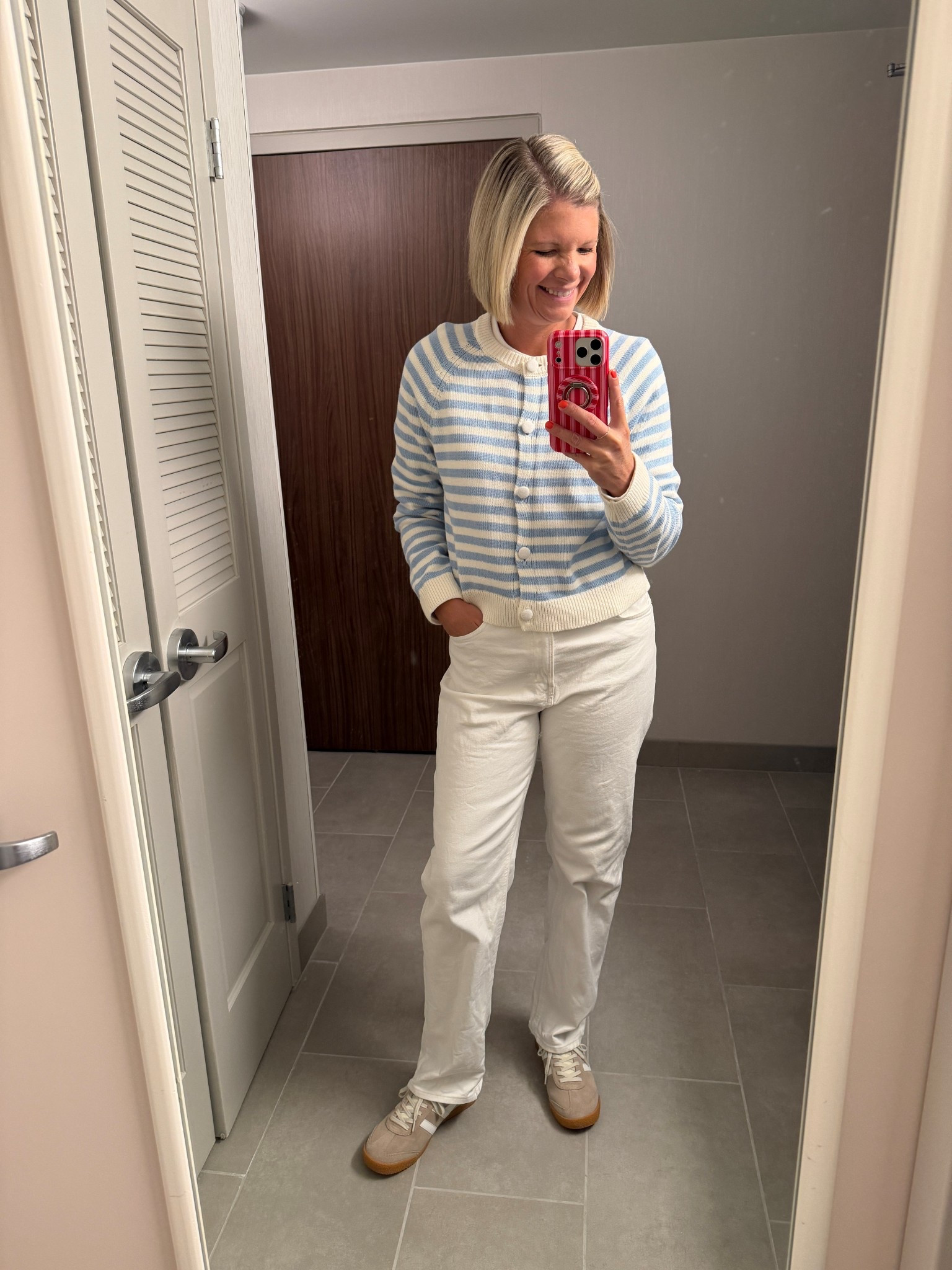 High rise straight leg white jeans TTS
Blue and white stripped cardigan sweater TTs
Tan and white sneakers TTs

#LTKMidsize #LTKOver40