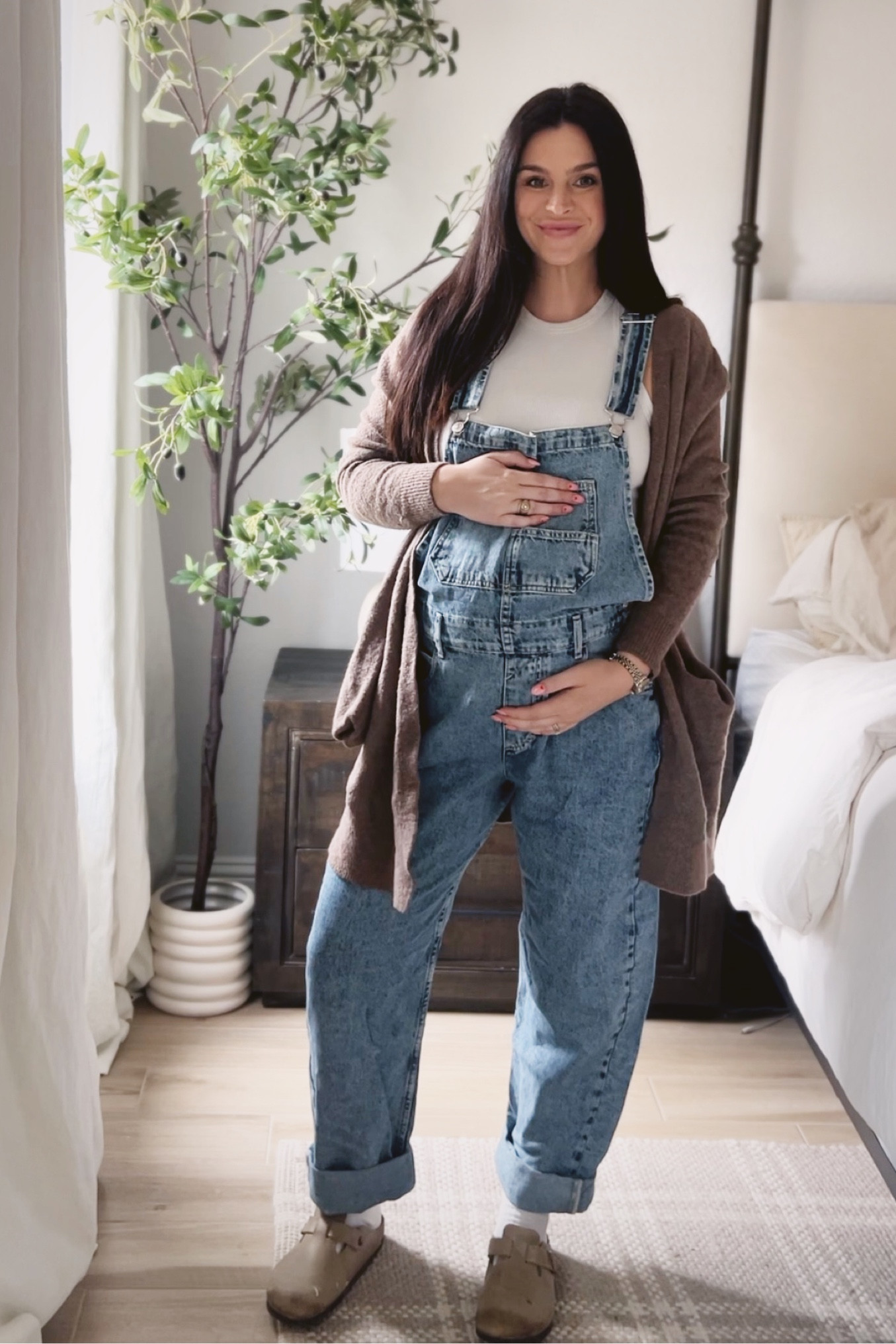 An easy transition into spring overall look! I sized up to a medium in the overalls to fit my bump. They come in so many colors and are so cute  

#LTKbump #LTKstyletip #LTKshoecrush
