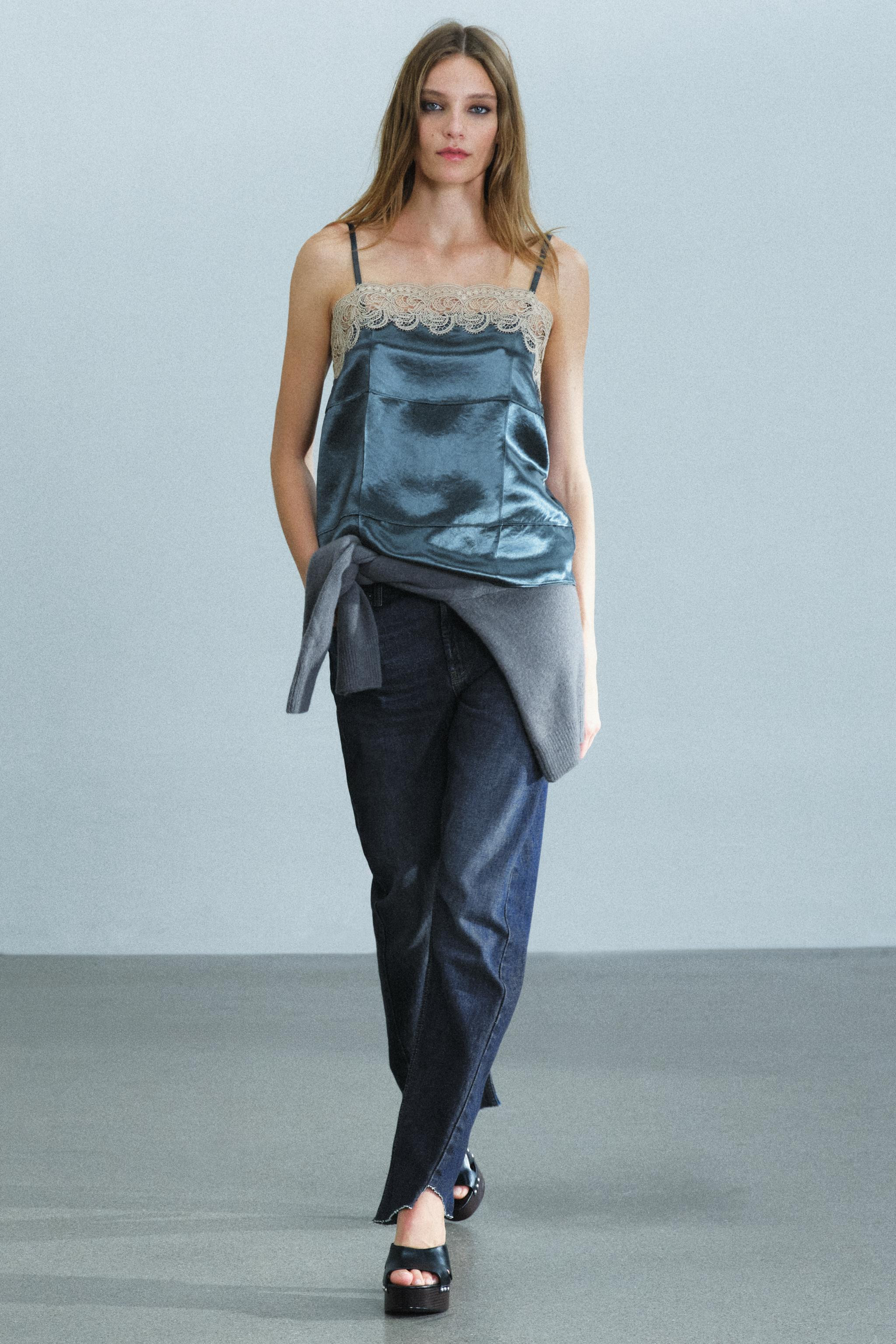 ZARA WOMAN COLLECTION. Satin slip top featuring a straight neckline and delicate adjustable strap... | Zara US