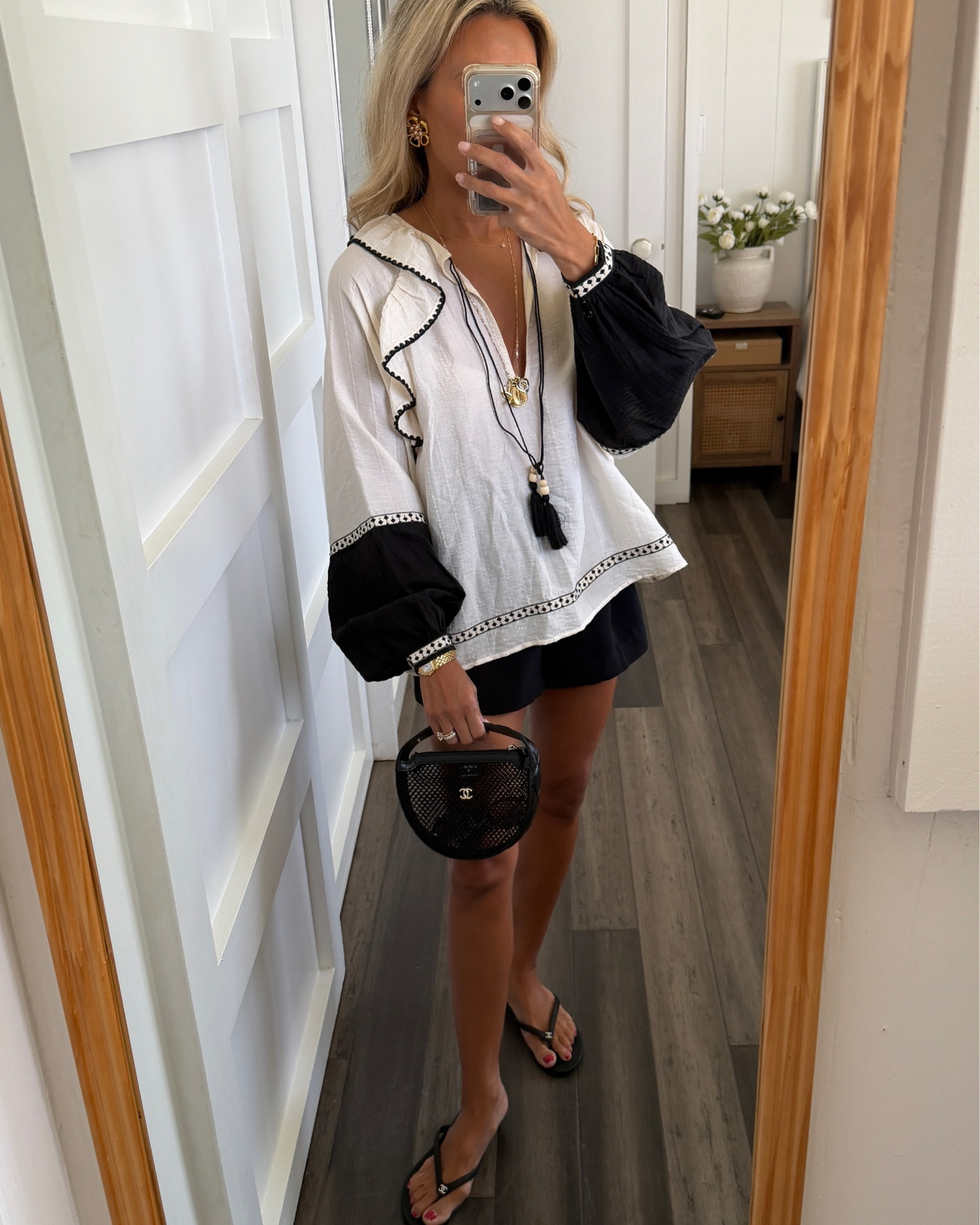 This ZARA TOP is so chic, tucked in or out. Feels very expensive and luxe! Shorts available in black in size 0. Top is xs. Chanel bag + sandals 

#LTKPetite #LTKTravel #LTKSeasonal