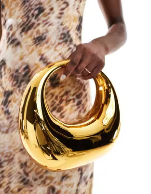 ASOS DESIGN hardcase scoop clutch in gold | ASOS (Global)