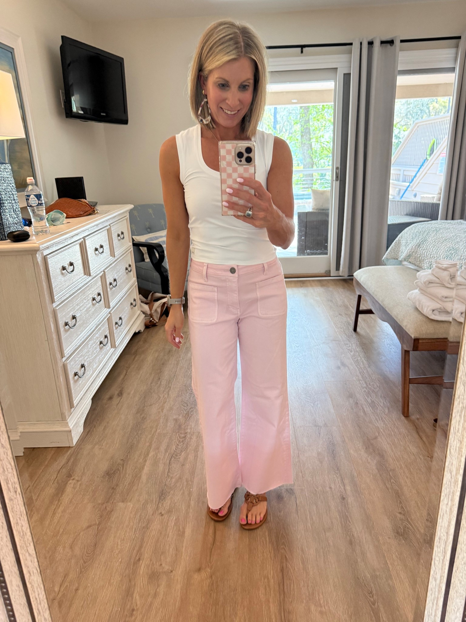 Love these light pink wide leg pants! They are so comfy and ca be dressed up or down. I’m wearing a 2. 