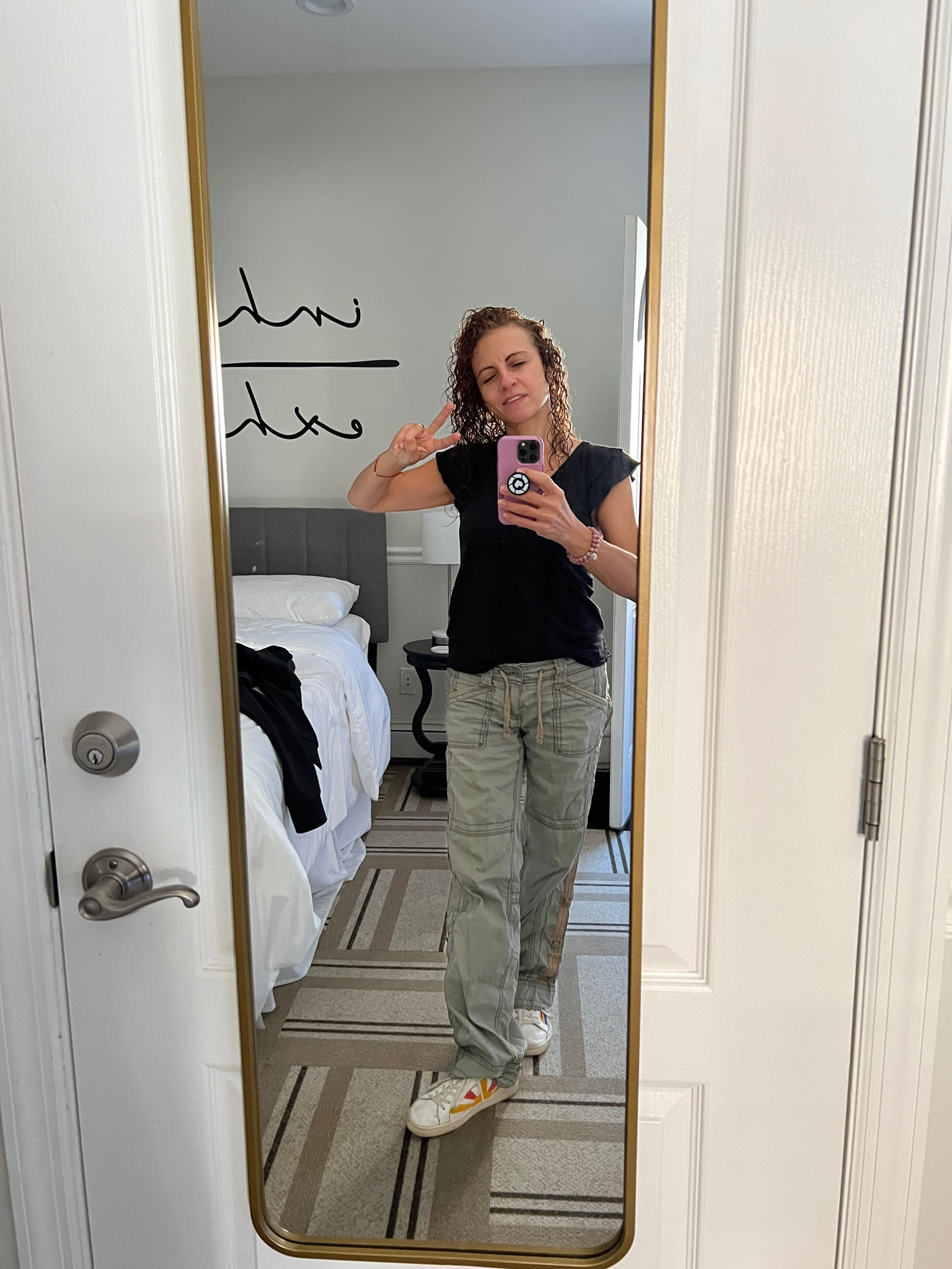 Fall fashion casual Friday work from home. Black flutter sleeve top with olive parachute pants and good vibes white sneakers! Happy Friday!!

#LTKStyleTip #LTKActive #LTKOver40