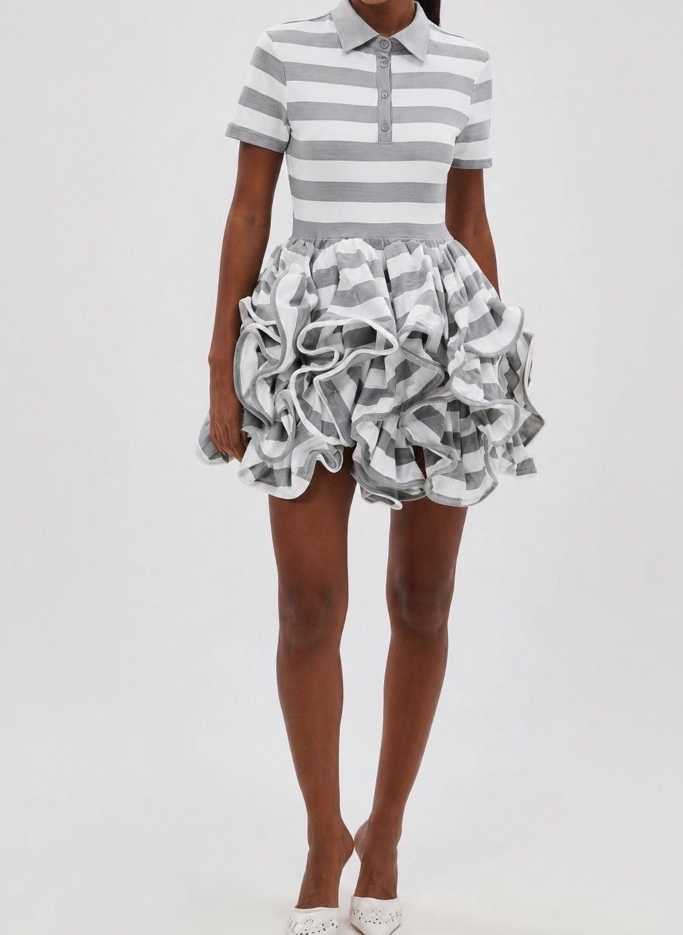 A statement dress that does all the talking! 🤍 This gray-and-white striped polo dress combines classic prep style with a bold ruffle skirt for a fashion-forward look that’s equal parts chic and playful. Perfect for brunch, special events, girls’ day out, or anytime you want to turn heads. Paired with white pointed-toe heels for a polished finish.

#LTKStyle #LTKFashion #StatementDress #FashionFinds #OOTD #ChicStyle #ElevatedCasual #DressInspiration #SummerStyle #FashionOver40 @AKIRA

#LTKU #LTKootd #LTKOver40