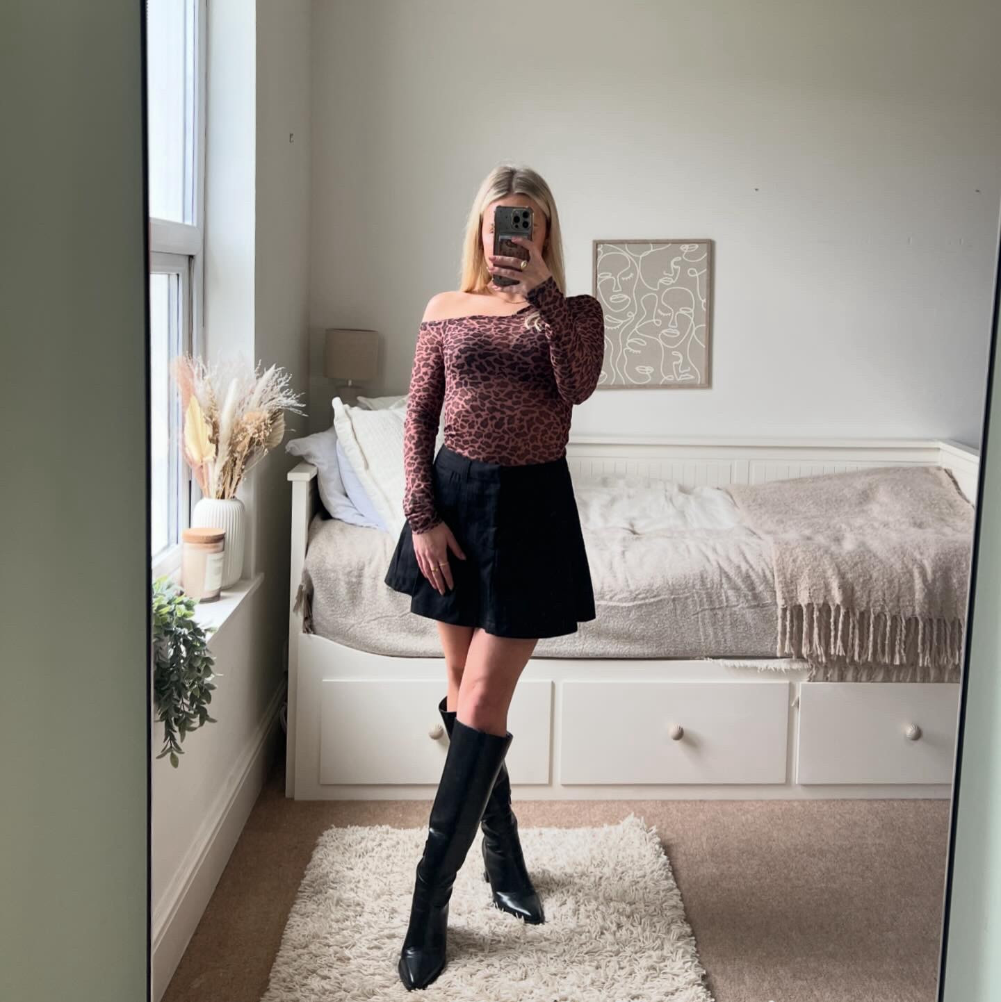 leopard print tops 🐆 
styled with a pleated mini skirt and knee high boots 🖤

#LTKstyletip #LTKSeasonal #LTKU