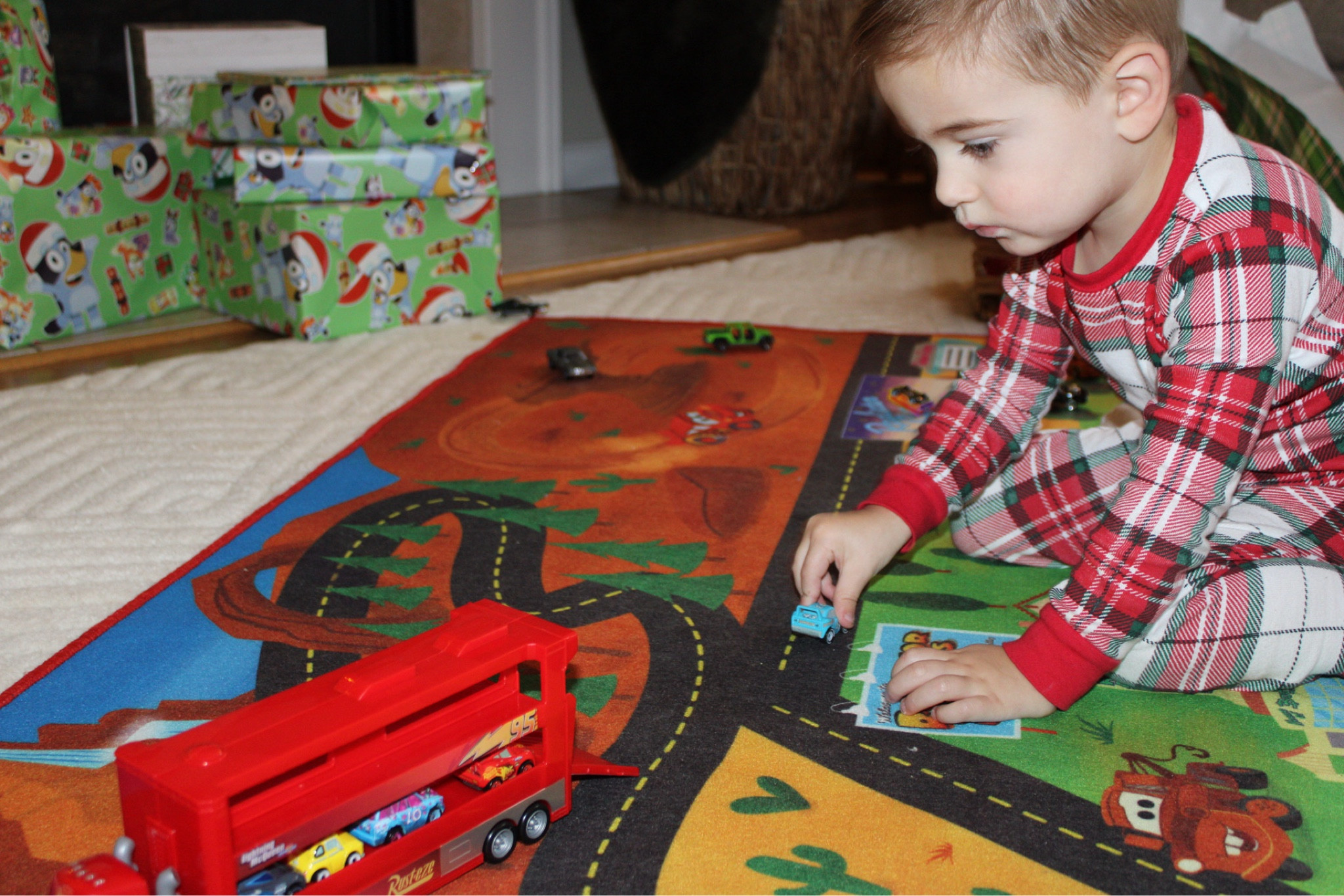 Hasn’t stopped playing with this since Christmas and I can’t sleep at night without knowing all 13 cars are accounted for 🙃

#LTKKids #LTKFindsUnder50 #LTKGiftGuide