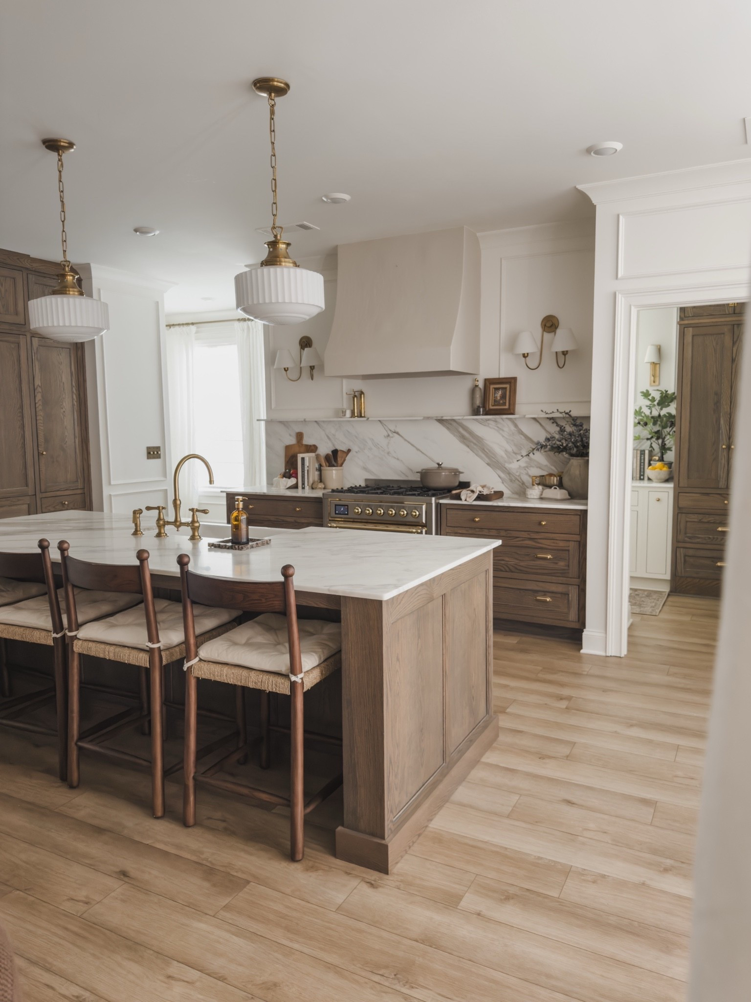 Timeless, collected kitchen with rich wood tones, unlacquered brass details, and aesthetic yet functional counter styling!

Home finds, neutral home inspo, kitchen refresh, collected style, rich wood tones, furniture favorites, unlacquered brass details, pendant lighting, wall sconce, counter stool, kitchen appliance details, counter styling, open concept kitchen, McGee and Co, Lumens, Home and Kids Co, Wayfair, ILVE, found it on Amazon, Pottery Barn style, shop the look!

#LTKSeasonal #LTKHome