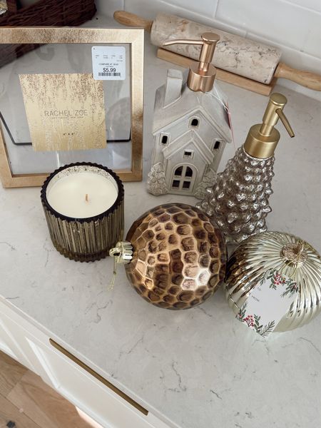 Homegoods haul for Christmas decor! Gold ornament candle. Mercury tree soap dispenser. Gold picture frame. Brass ornament. Linking similar  

#LTKhome #LTKunder50 #LTKHoliday