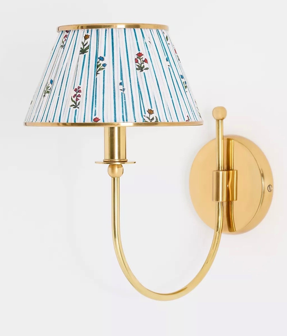 Loving this brass sconce. The shade style is available in several patterns

#LTKSeasonal #LTKSaleAlert #LTKHome