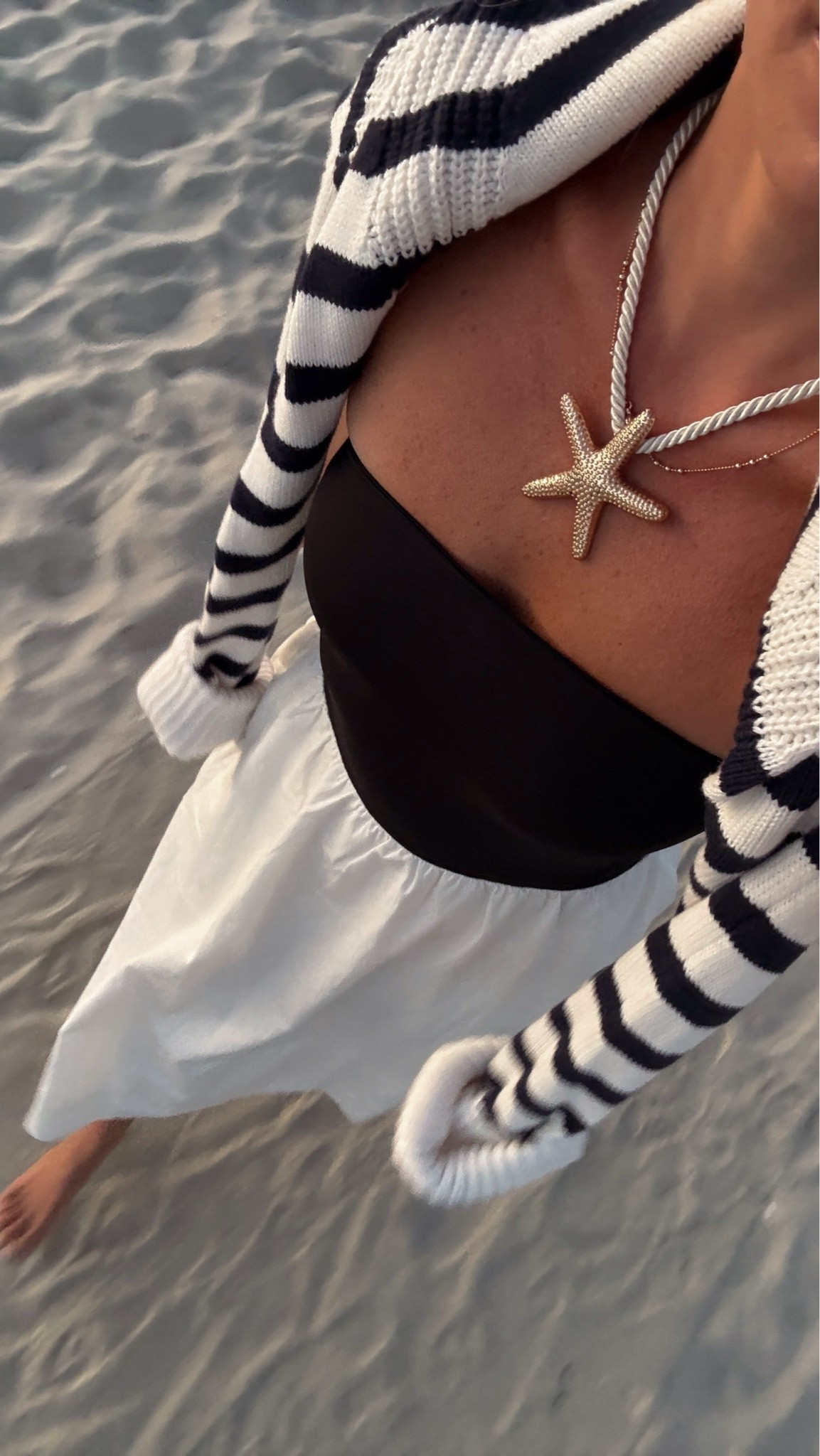 Perfect neutral girl outfit - loving the striped sweater & starfish necklace with this dress! 

Black and white dress, b&w fit, striped sweater, strapless dress, beach vacation, beach travel, coastal summer, coastal outfit, New England fashion

#LTKootd #LTKSeasonal #LTKTravel
