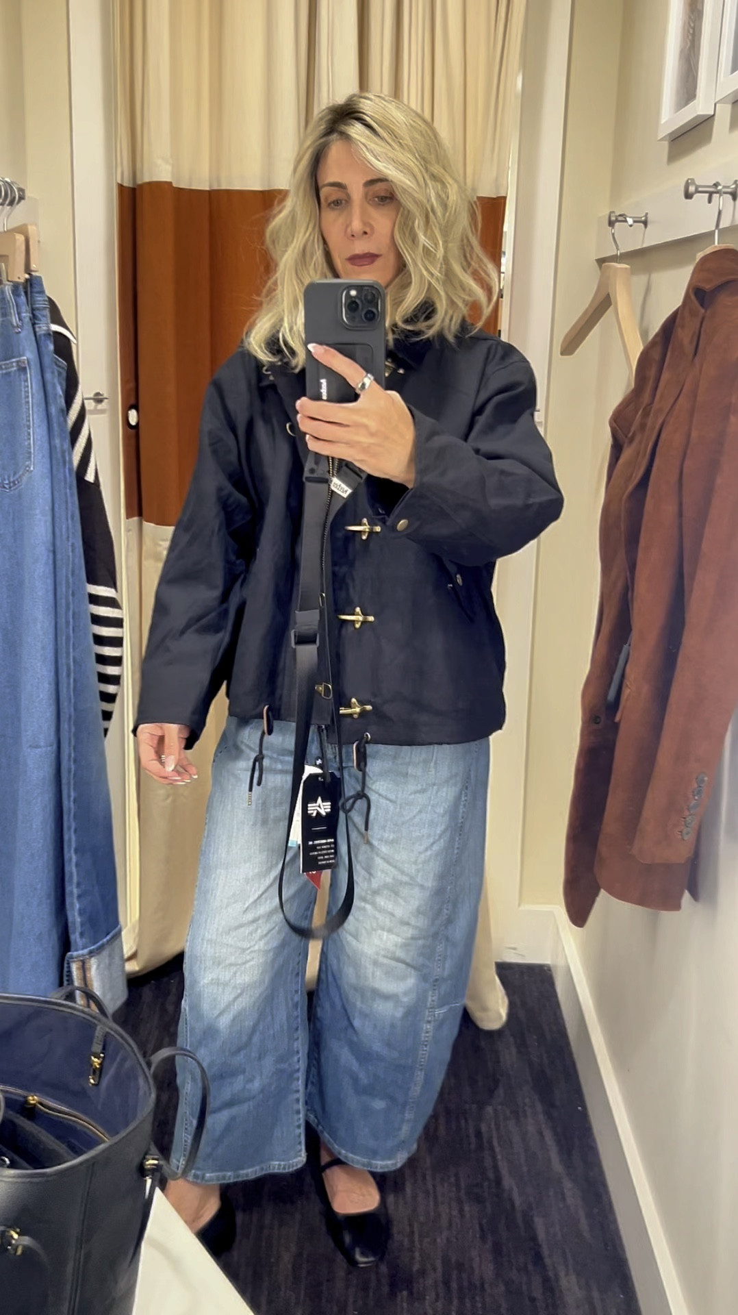 This canvas jacket with gold hook closures caught my eye. It’s very boxy and runs super big. I’d size down 2 sizes. 

#LTKOver40 #LTKStyleTip