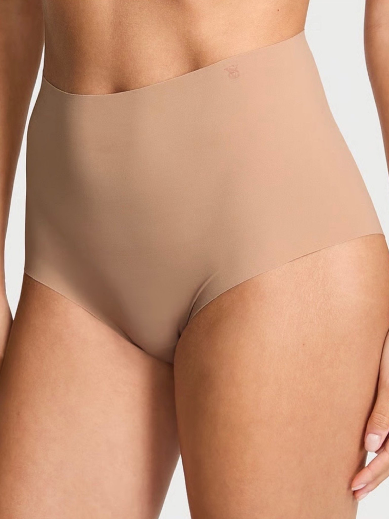I wear a similar pair to these with my satin skirts! No lines!