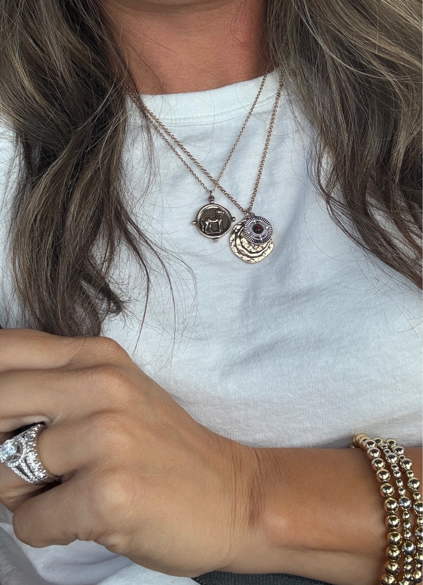 A closer look at my travel day jewelry ✨ This Target necklace set makes layering SO easy and looks way more expensive than it is!

#LTKCon #LTKTravel #LTKdayinmylife