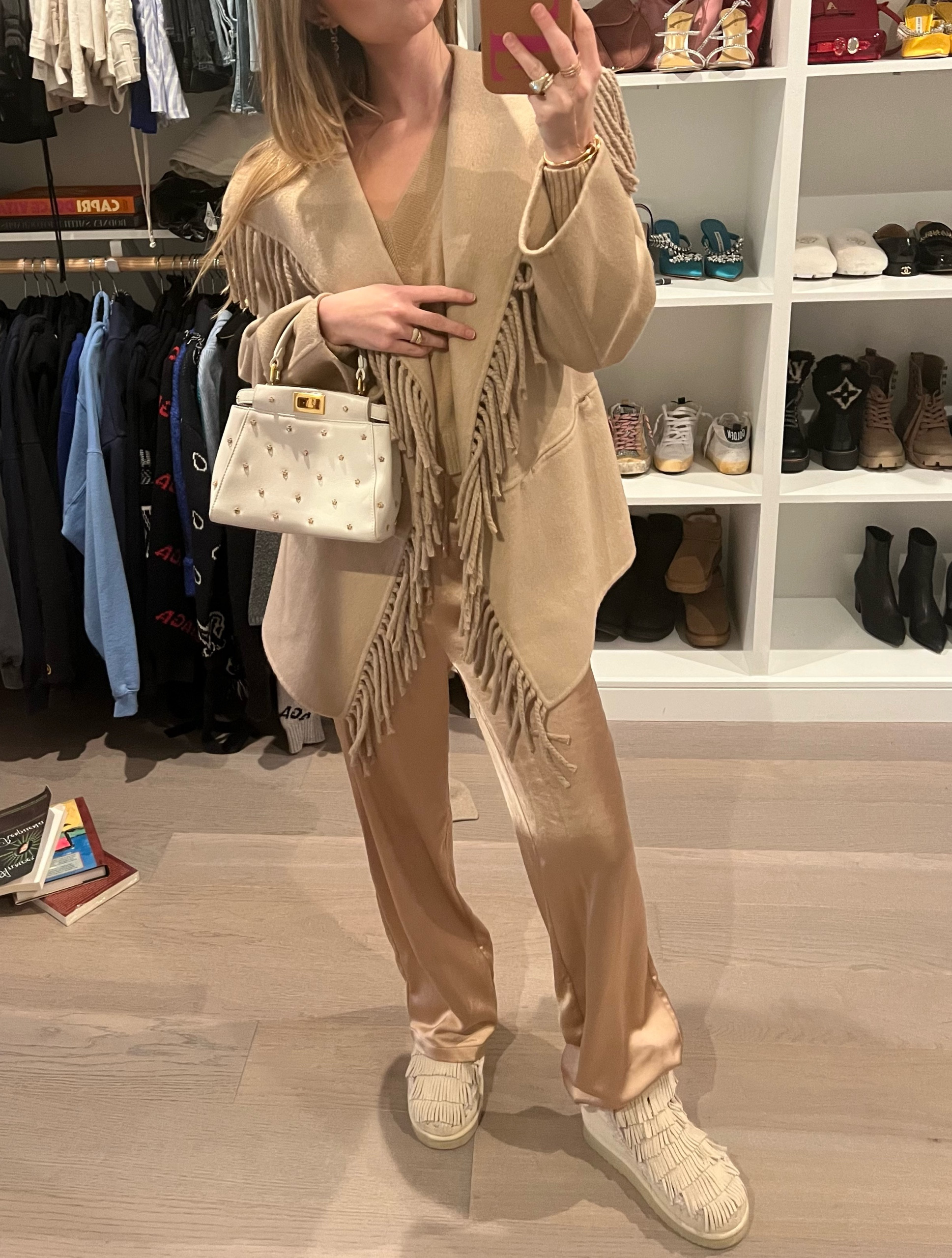 Mou boots in white fringe, bag is fendi peakaboo 

#LTKSeasonal #LTKSale #LTKeurope