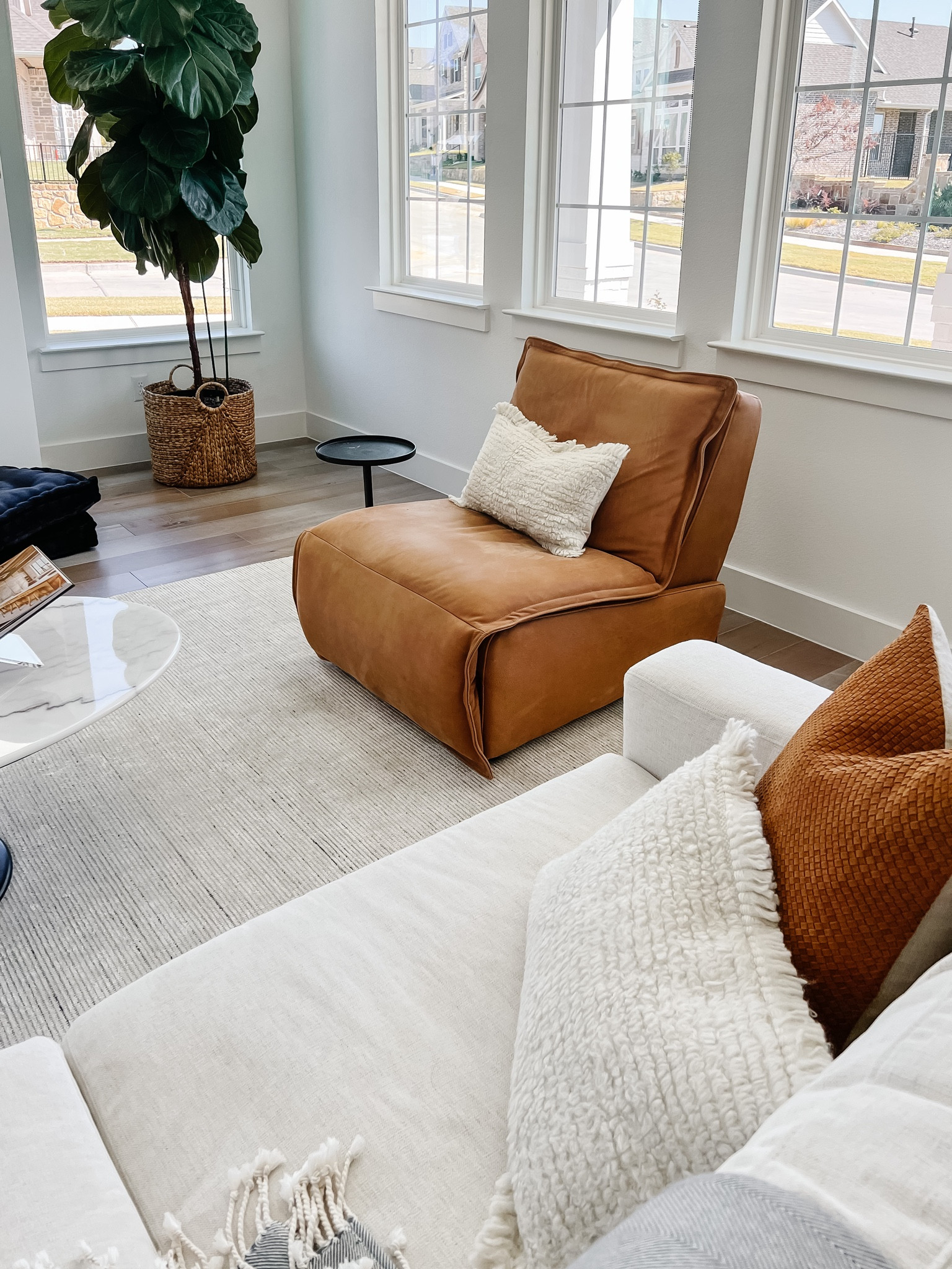Living room furniture with our favorite leather recliner on sale! We love how comfortable and beautiful this accent chair is. It fits in with our transitional aesthetic and looks beautiful with our ivory area rug, white sofa and neutral decor  

#LTKhome #LTKsalealert #LTKFind