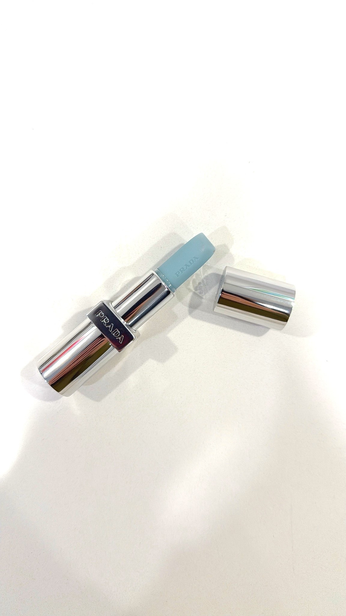 Prada Balm in the shade Astral pink is a lip-blushing formula with Micro-Blushing Technology that adapts to the lips PH. The blue bullet transforms into pink. 

#LTKbeauty #LTKstyletip #LTKgiftguide