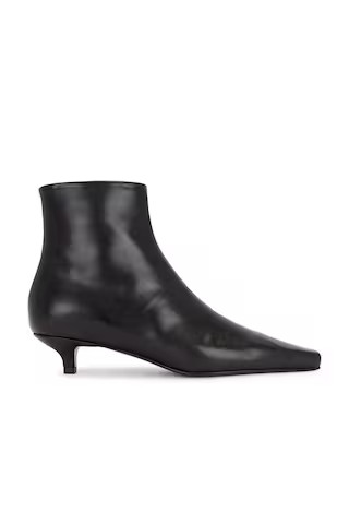 Toteme The Slim Ankle Boot in Black | FWRD | FWRD 