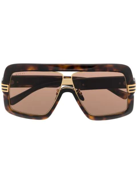 Gucci Eyewearlentes de sol con armazón oversize | Farfetch Global