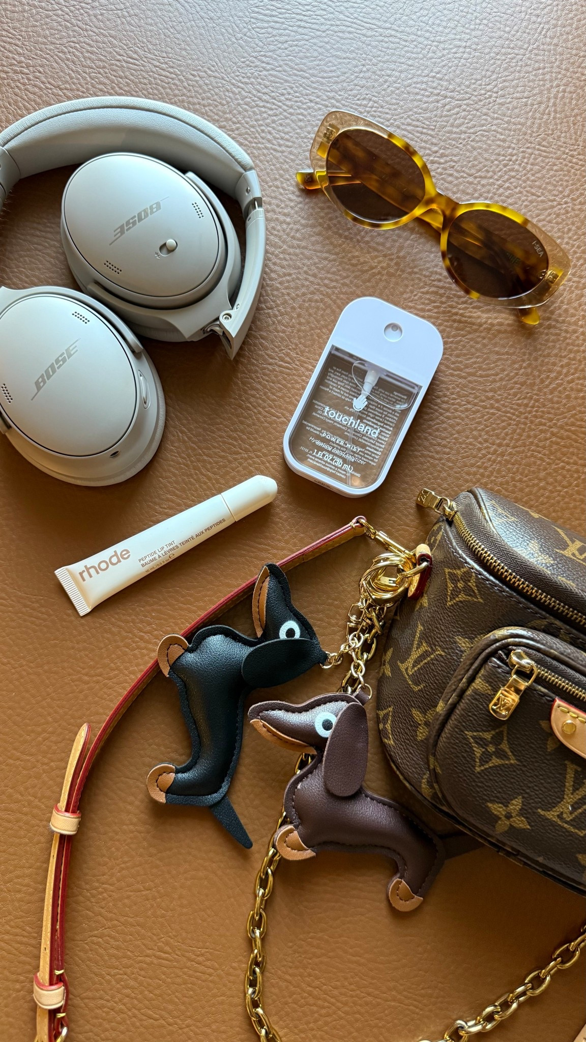Name a more Lauren combo? I’ll wait. A bunch of new and old things together that I simply cannot live without! Hand sanitizer, rhode lips (or any lippie), sunglasses, headphones, dachshund everything 💅🏼

#LTKItBag #LTKStyleTip