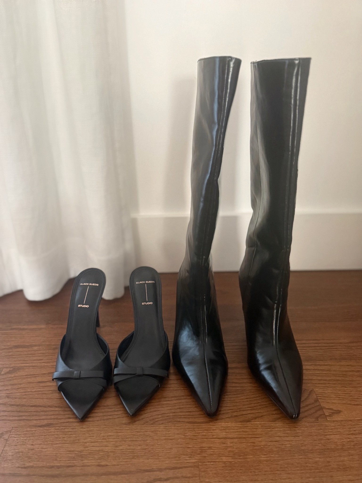 Two closet staples for winter into spring, black leather or satin heeled mules and glossy knee high pointy black boots. 

#LTKootd #LTKSeasonal #LTKSaleAlert