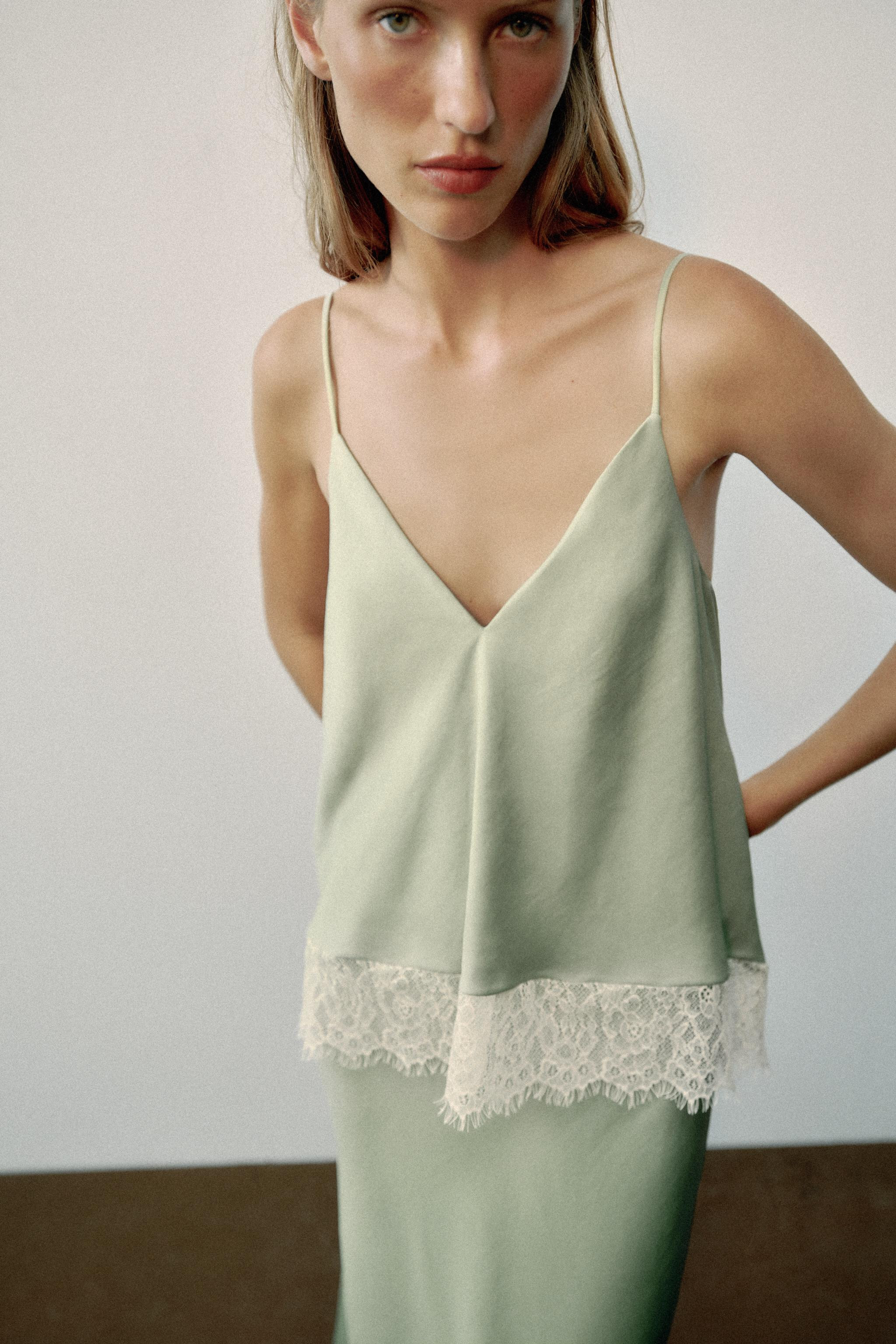 V-neck midi dress with spaghetti straps, crafted from a combination of satin and lace fabrics. | Zara US