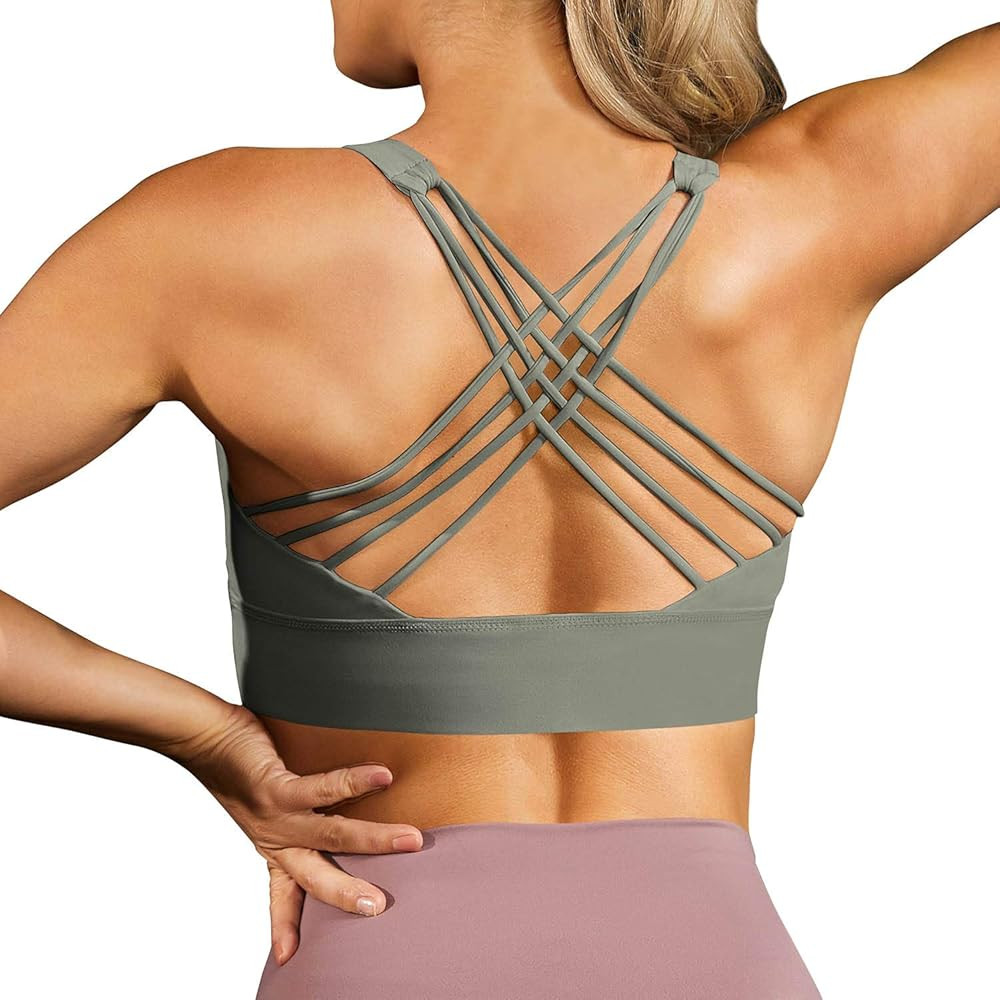 TORARY Women's Strappy Sports Bra, Medium Support Yoga Bras with Removable Pads | Amazon (US)