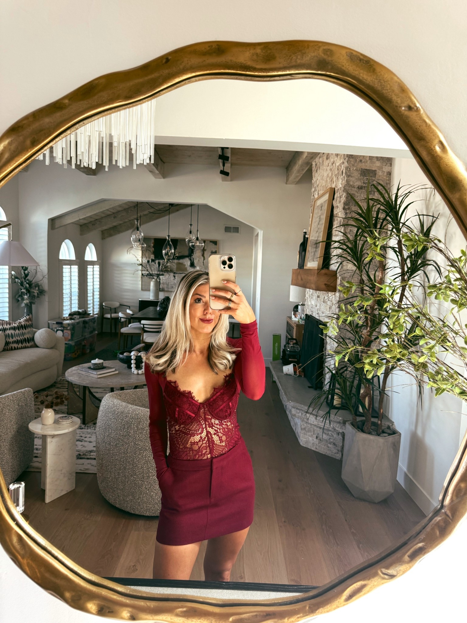 It’s giving holiday chic! Love this burgundy red lace bodysuit from revolve. Pairs perfectly with this little red skirt. Wearing an XS in both. Also linking my lipstick and gold heels - a holiday season outfit must! 

#LTKHoliday #LTKFindsUnder100 #LTKStyleTip