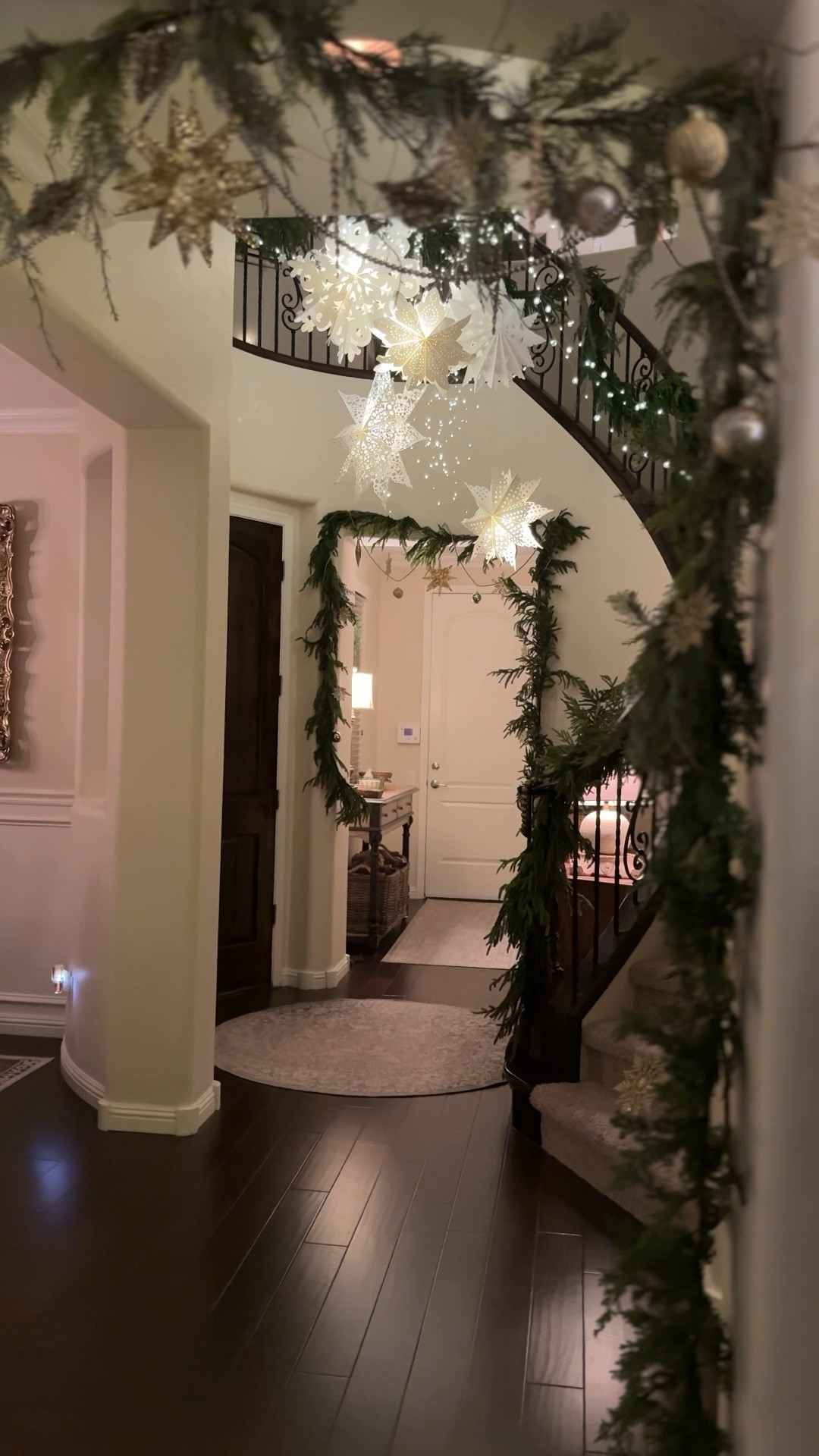 Create a magical & enchanting entryway for the holiday season. 

I put the puck lights inside the paper snowflakes so that I could control the lighting with a remote.

#holidaydecorating #entryway #snowflakes #christmasdecor 

#LTKHome #LTKHoliday #LTKVideo