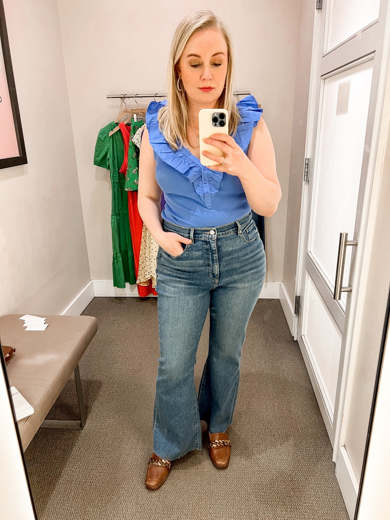 Love the drama on this ribbed tank. It’s a beautiful hyacinth color and also comes in white and black. Jeans have a raw hem. I’m wearing a petite. Would need a regular length if I had a heel. #hocspring 