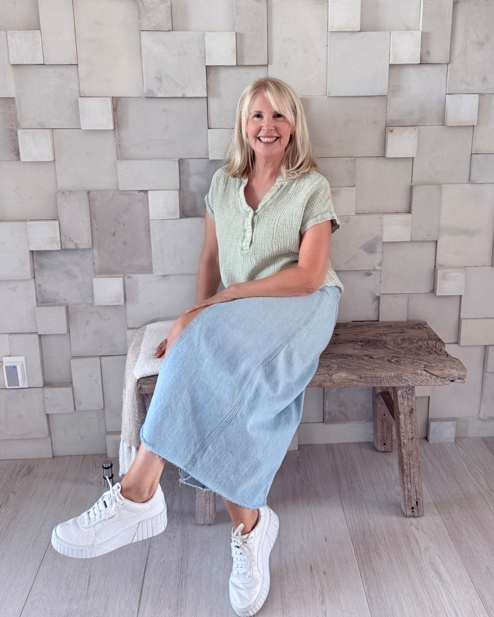 Soft and comfy cotton shirt. I liked this so much, I bought it in other colors, too. Paired with a denim skirt ( mine is a lighter wash than the one still available), and platform sneakers to make me look a tad taller!