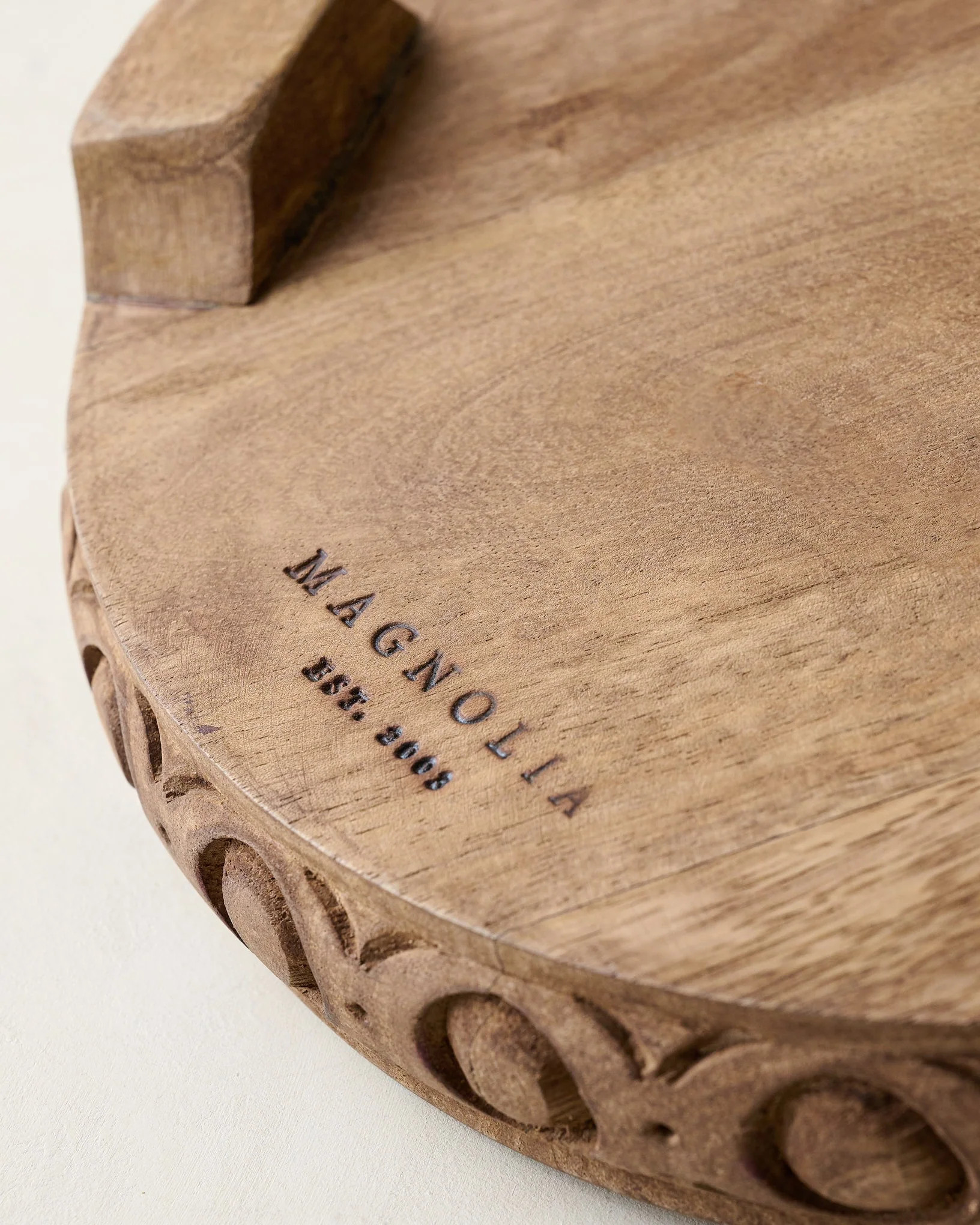 Antiqued Carved Wood Round Riser | Magnolia