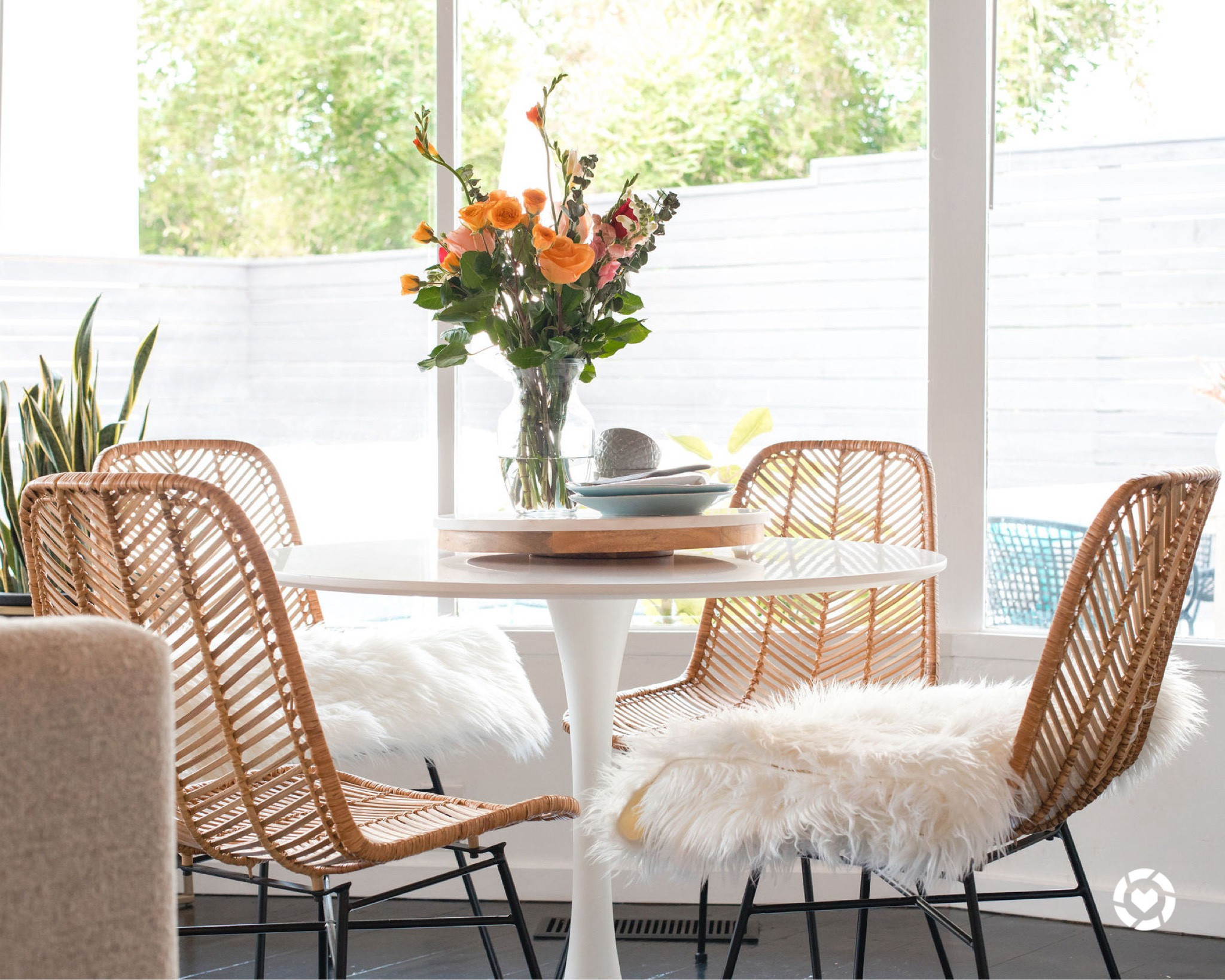 This detail shot of our dining space remains one of my favorites from our beach house photo shoot! This really captured my vision for the space and the different textures used in the sheepskins, wicker chairs and greenery!

#LTKKids #LTKHome #LTKFindsUnder100
