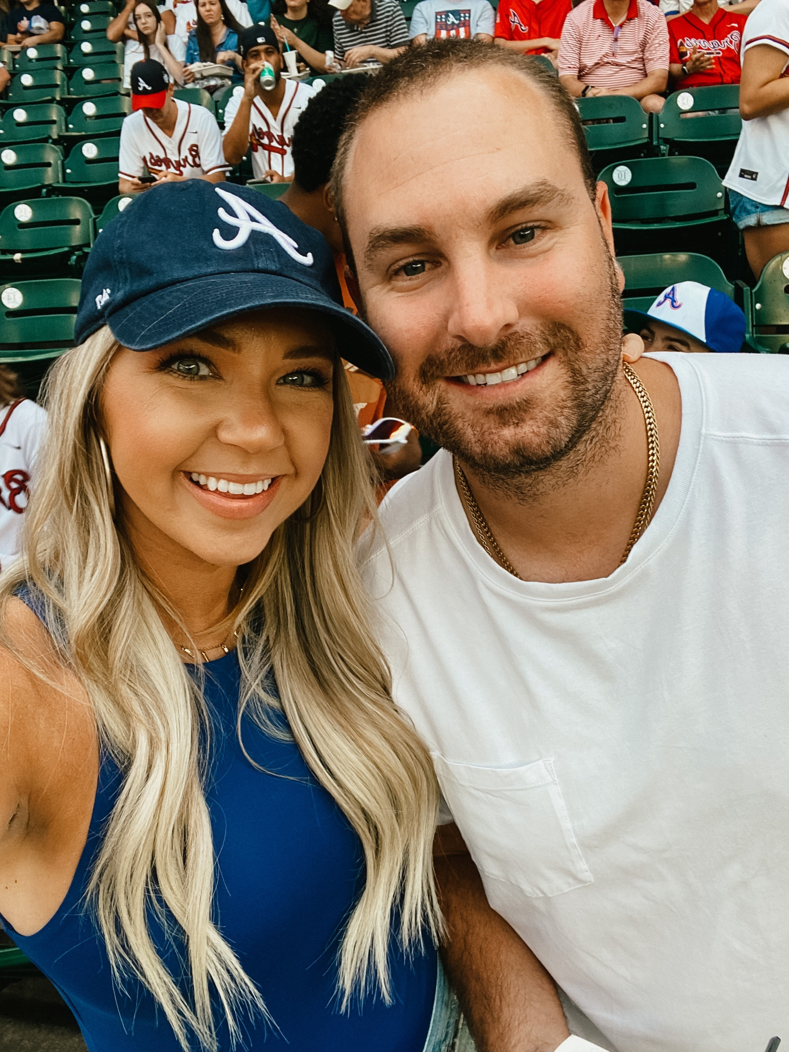 Atlanta Braves Game. 21 weeks pregnant. 
I have 3 or 4 colors in this bodysuit and it’s THE BEST! Wearing size small. 
Linking the shorts I was wearing here too! Sized up to 26 for bump for now. The best denim shorts. 

#LTKunder50 #LTKtravel