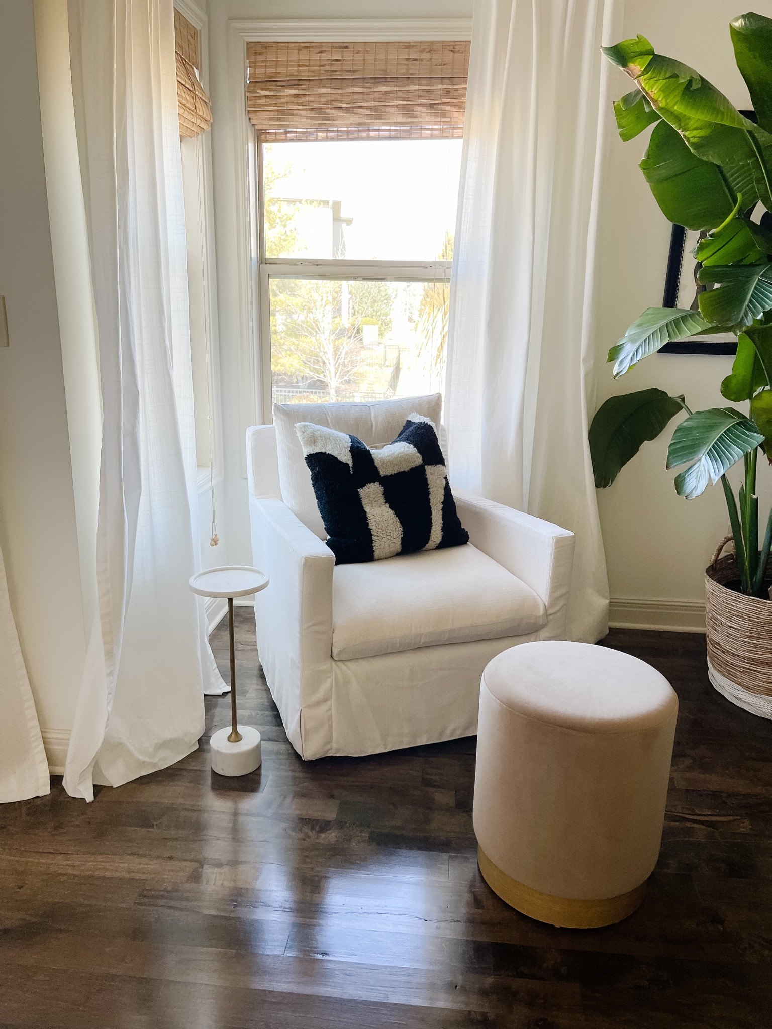 Bedroom nook, bedroom corner, bedroom styling, black dresser, white chair, west elm dresser, black and white pillow 

#LTKhome