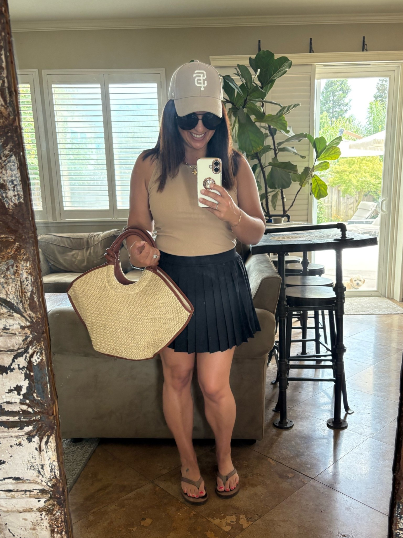 Walmart is absolutely crushing it lately. 🤎

This entire outfit is affordable, comfortable, and perfect for summer errands, ball games, travel days, or casual weekends.

✨ Ribbed tank under $5 (wearing a medium)
✨ Pleated tennis skirt under $13 (wearing a small)
✨ Raffia tote under $25

I love finding pieces that look much more expensive than they are, and this outfit checks every box. Neutral, classic, easy to mix and match, and budget-friendly.

#LTKActive #LTKSeasonal #LTKmomlife