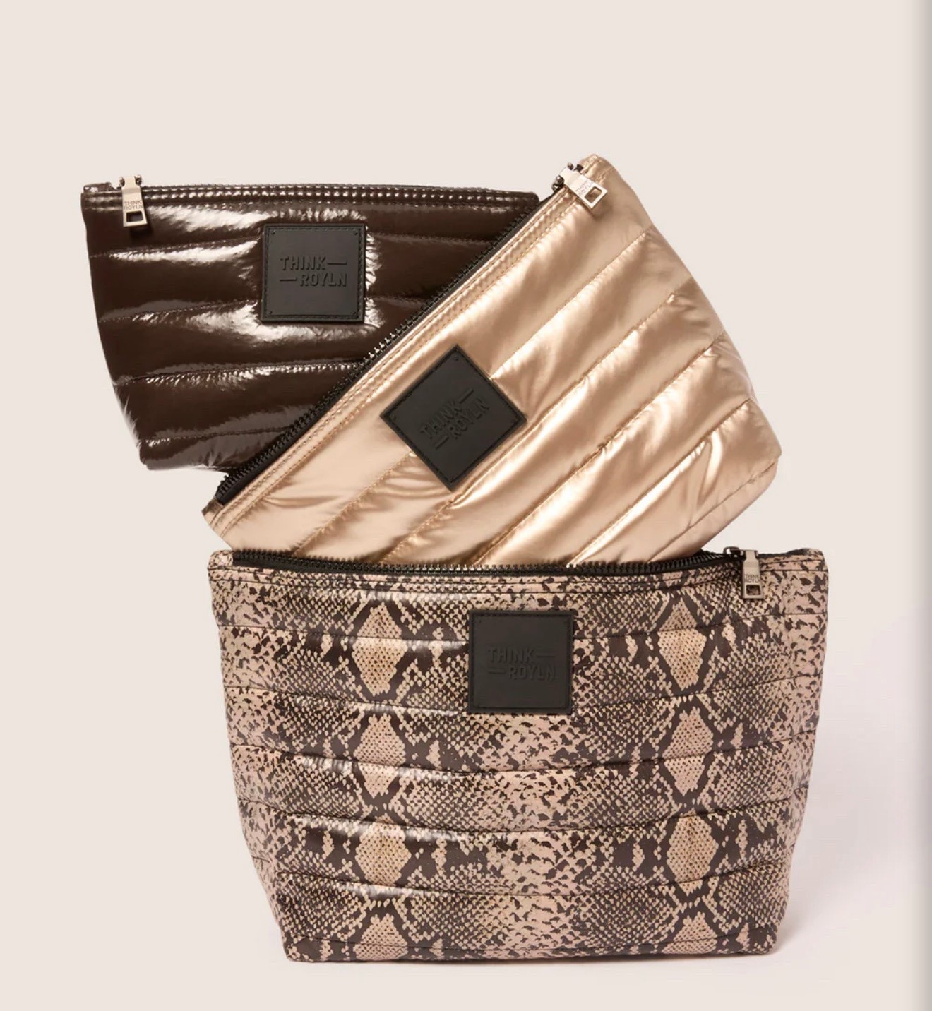How adorable is this set of travel bags?? I love the colors and the python print! Under $100. Give as a set or break it up into 3 separate gifts.

#LTKOver40 #LTKGiftGuide #LTKFindsUnder100