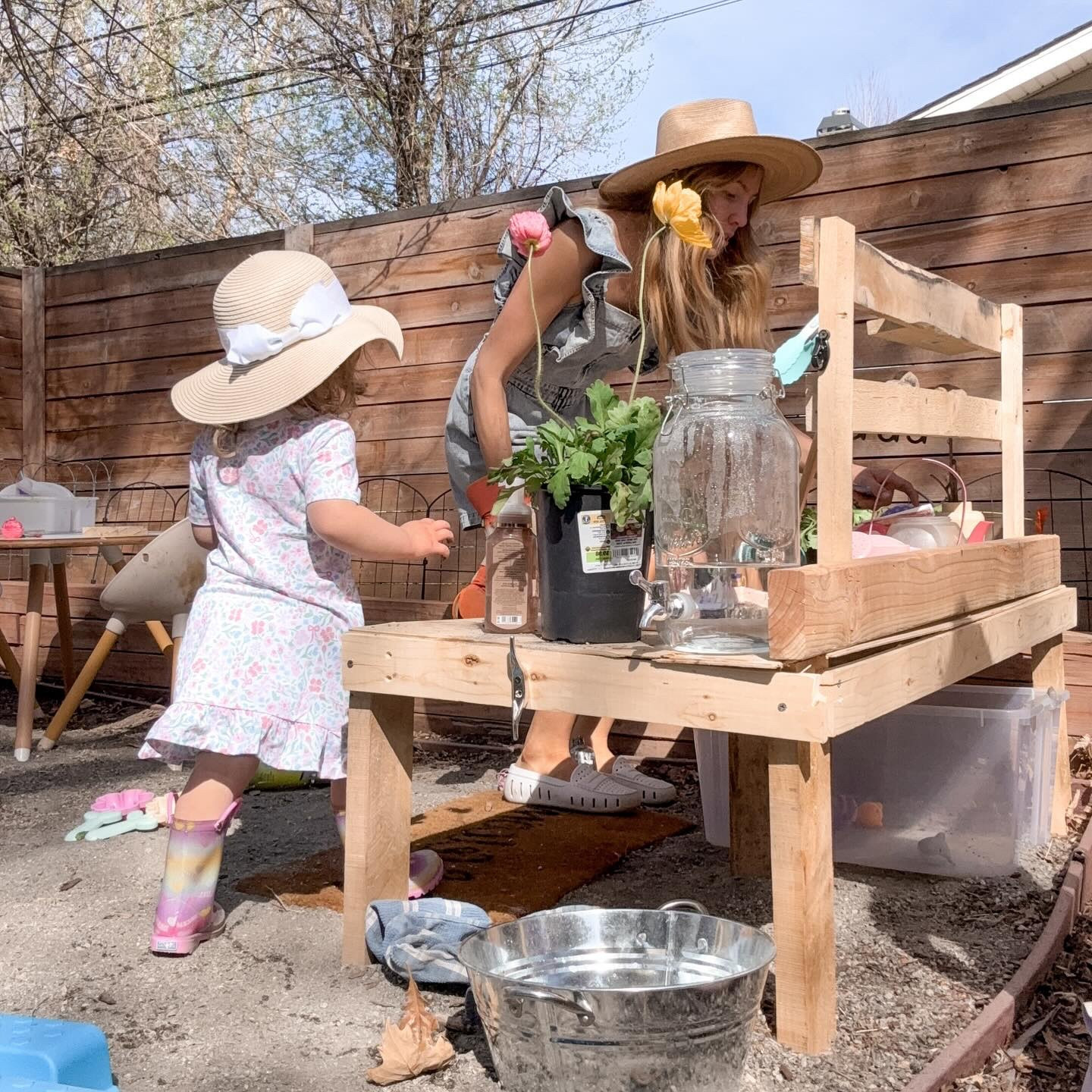 In our gardening era together 🪴🏡

#gardening #girlmom #springplanting #springblooms #toddlergarden