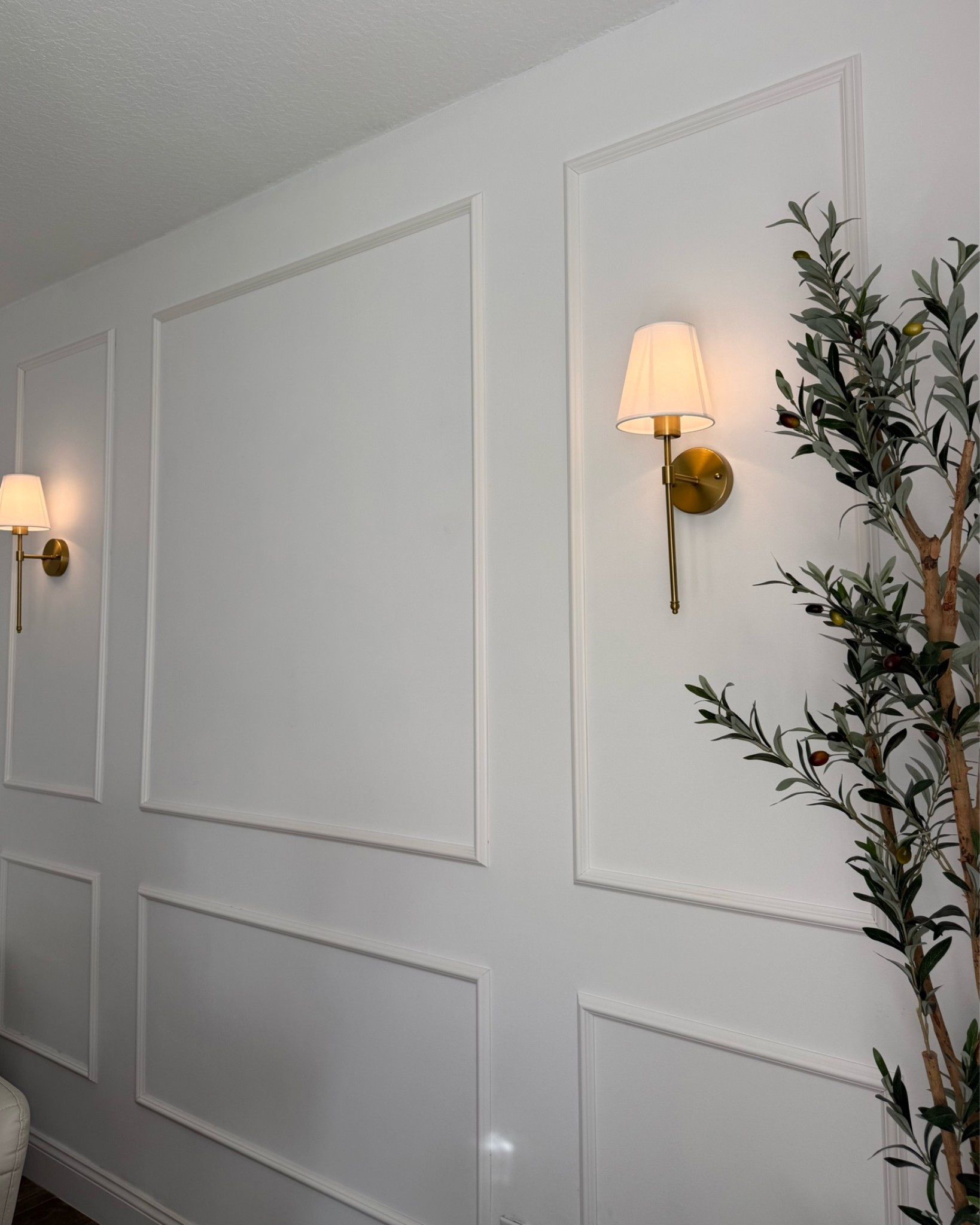 DIY wall molding and wireless wall sconces in my home office! The battery life on the sconces are so good! Comes with a remote to change the color temp and brightness 🔅 

Amazon finds, interior design, faux olive tree, wall molding, home accents, gold lamps, fancythingsblog

#LTKHome