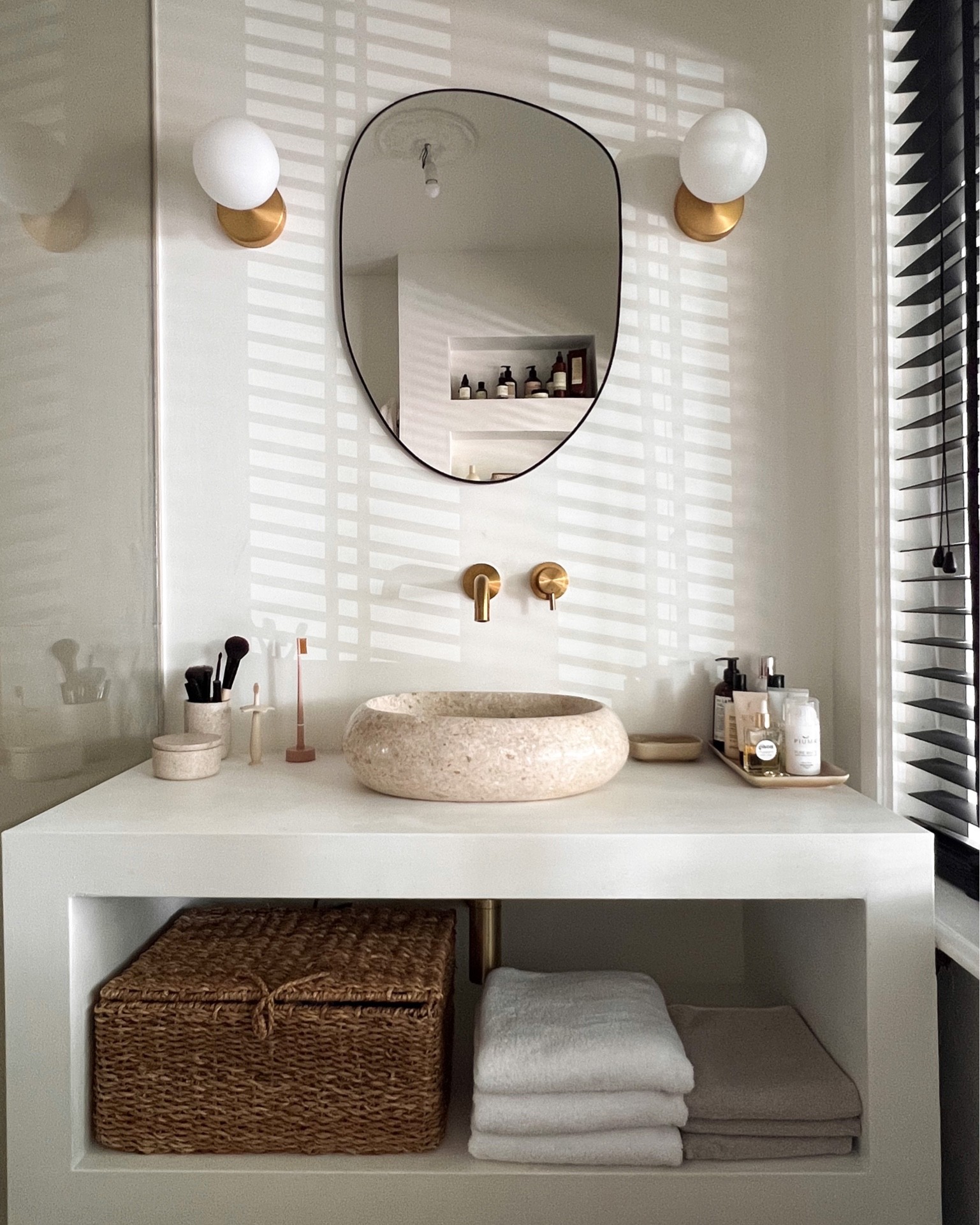 So happy with our bathroom. I’m in love with the marble washbasin, the golden bathroom tap and asymmetric mirror.

#LTKhome #LTKeurope