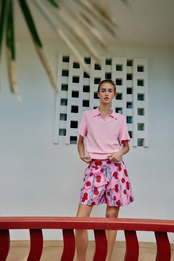 Polo collar and short sleeve top with shirring at shoulders. Front buttons. | Zara US