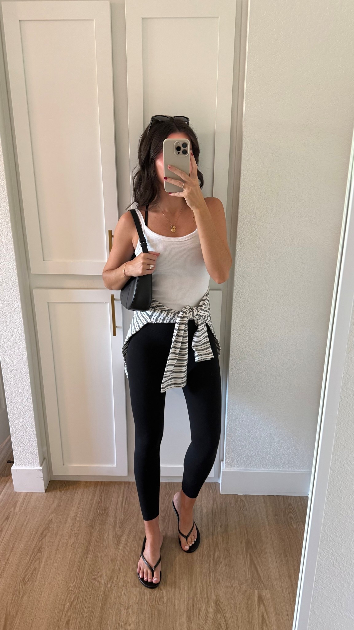 Comfy outfit of the day for Sunday errands! I’m 5’7” wearing a size XS in the workout set and small in the tank top and striped long sleeve shirt! 

#LTKStyleTip #LTKActive #LTKFindsUnder100