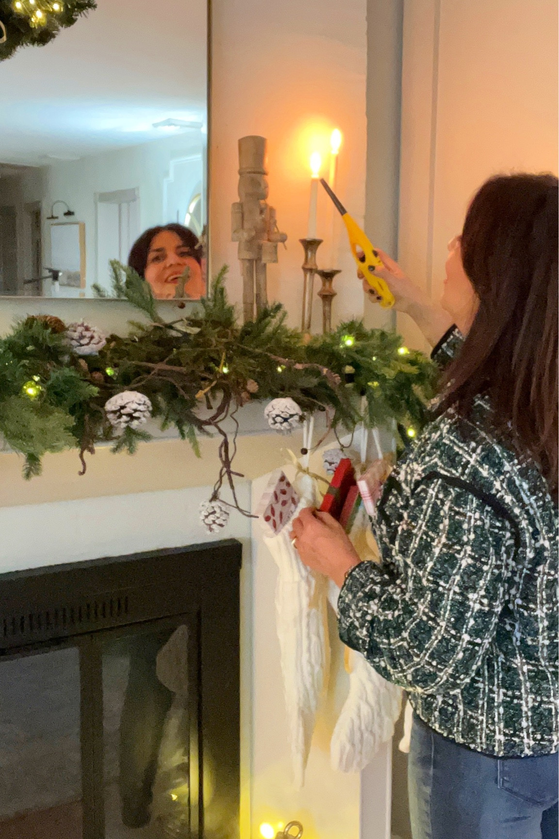 This Christmas I want feel all the coziness of the season. Decorating the fireplace mantel with batteries candles is so inexpensive way to have this magic ! 
Also used two garlands together with the best long hooks ever, putting some classic pine cones and of course, Santa Socks ! Looks magical! 

#LTKHoliday #LTKstyletip #LTKhome