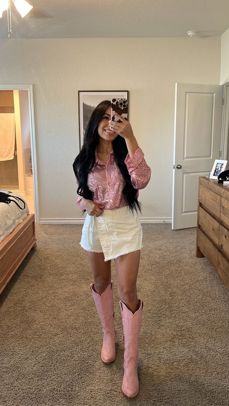 BARBIE INSPIRED WESTERN OUTFIT 🤠 | PART V
THE DAY HAS COME! Yesterday the Barbie movie premiered but I’m finally getting a chance to watch it with the girls today! Sharing one of two more looks I have in my barbie series, and I’m sad that it’s coming to an end 🥲
 
This sparkly top is from @shopreddress and comes in three colors. Perfect for a night out with your gals or a country concert this summer! Super lightweight and fun! Linking my entire fit in stories and sharing a few other pieces I received from Red Dress! 

#barbie #hibarbie #hiken #barbiethemovie #barbiestyle #barbieoutfit #barbiedoll #barbiegirl #westernbarbie #cowgirlbarbie #concertoutfit #cowgirlboots #westernfashion #cowgirlchic country concert outfit | country concert ootd | morgan wallen concert outfit | cowgirl boots outfit | cowgirl style | cowgirl chic | western fashion inspo | western outfit | western style

#LTKunder100 #LTKshoecrush #LTKstyletip