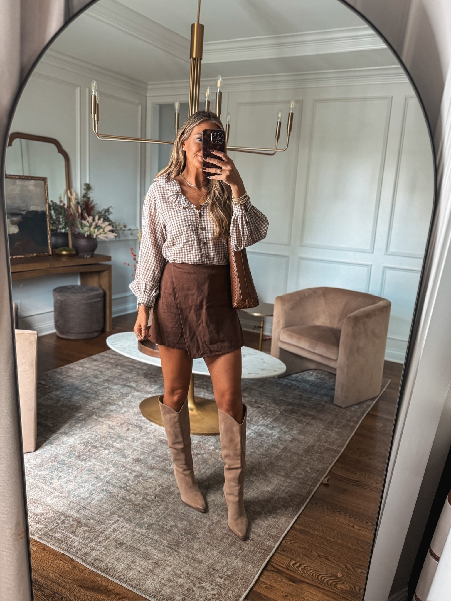 The cutest fall outfit! 🍂 gingham top and brown skort plus my boots are on major sale! 

Wearing a small in the top & skort. 
Boots size up a half 

#LTKStyleTip #LTKCon #LTKFindsUnder50