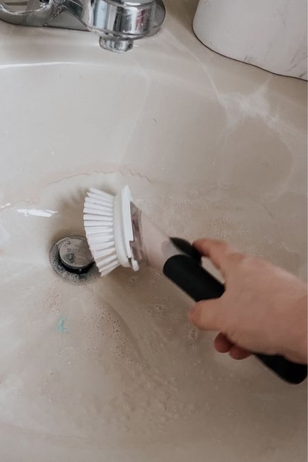 Cleaning the bathroom sink with my fav soap dispensing brush #cleaningg

#LTKhome