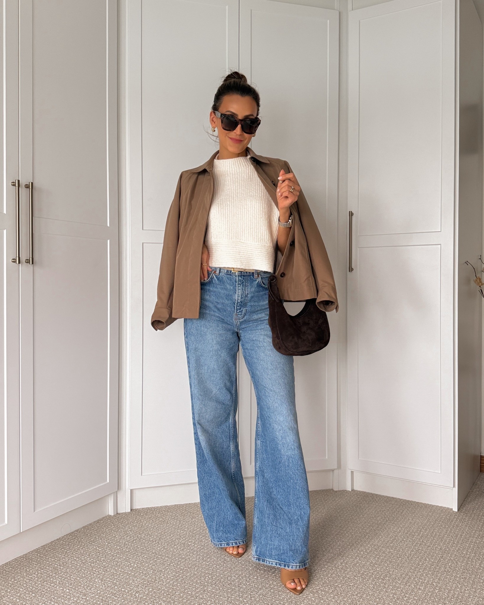 Cute jeans outfit idea! Love this cropped shirt sleeve sweater for spring, the cape trench is such a cute piece. Xs both fit slightly oversized. Jeans 26, live this wide leg cinched waist fit. 

#LTKStyleTip #LTKSeasonal #LTKItBag