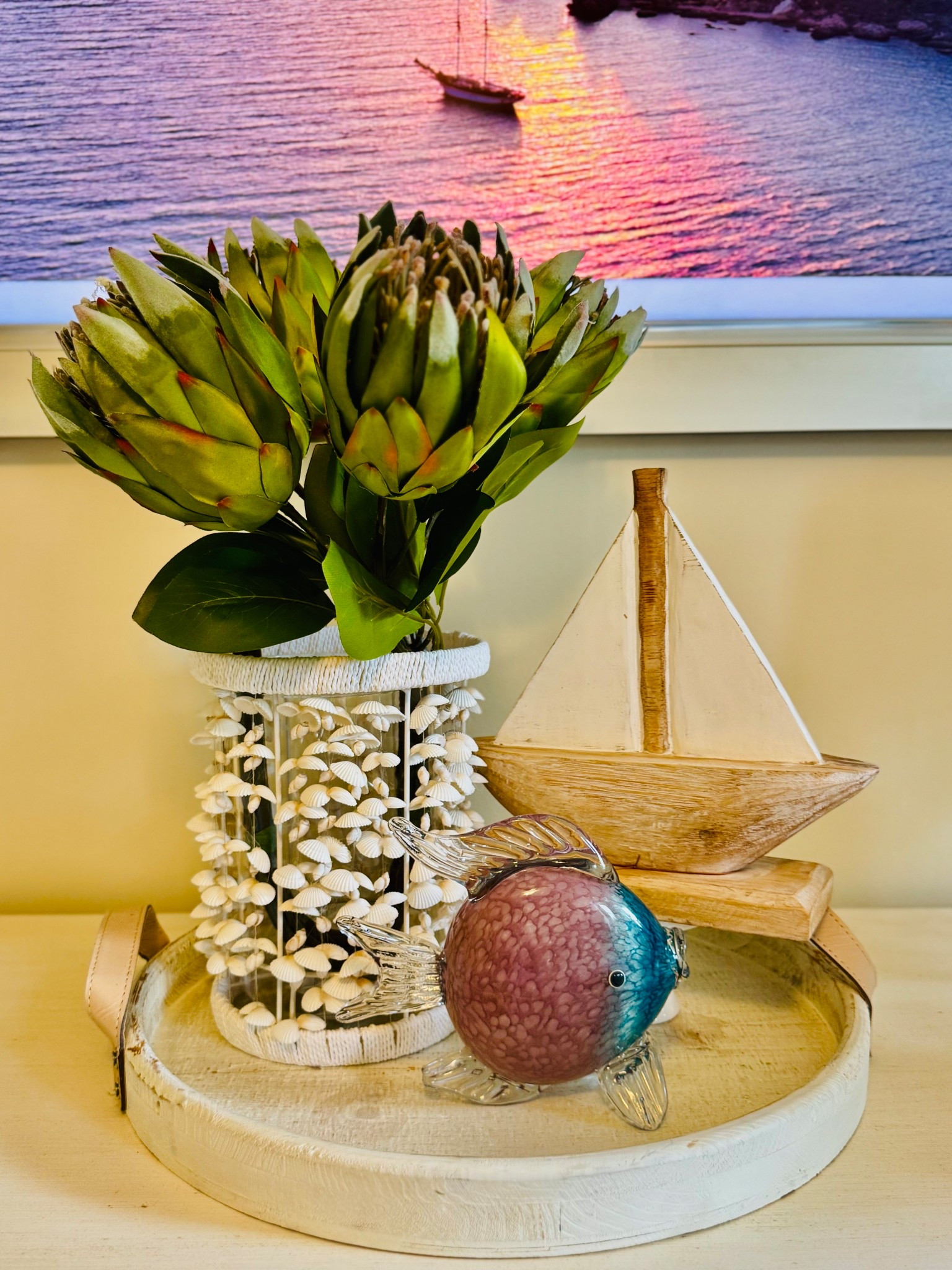 Coastal charm meets sunset serenity 🌊⛵️ This little vignette brings all the seaside feels—shells, sails, and a pop of protea perfection.

#CoastalDecor #BeachHouseVibes #NauticalStyle #ShellAccents #GlassFish #SunsetSerenity #SummerStyle #OceanInspired #DecorDetails #HomeStyling #VignetteGoals #ProteaLove #TrayDecor #CoastalChic #InteriorInspo #SeaSideStyle #NauticalNook #BeachyDecor #SailboatStyle #HomeVibes


#LTKSeasonal #LTKHome #LTKItBag